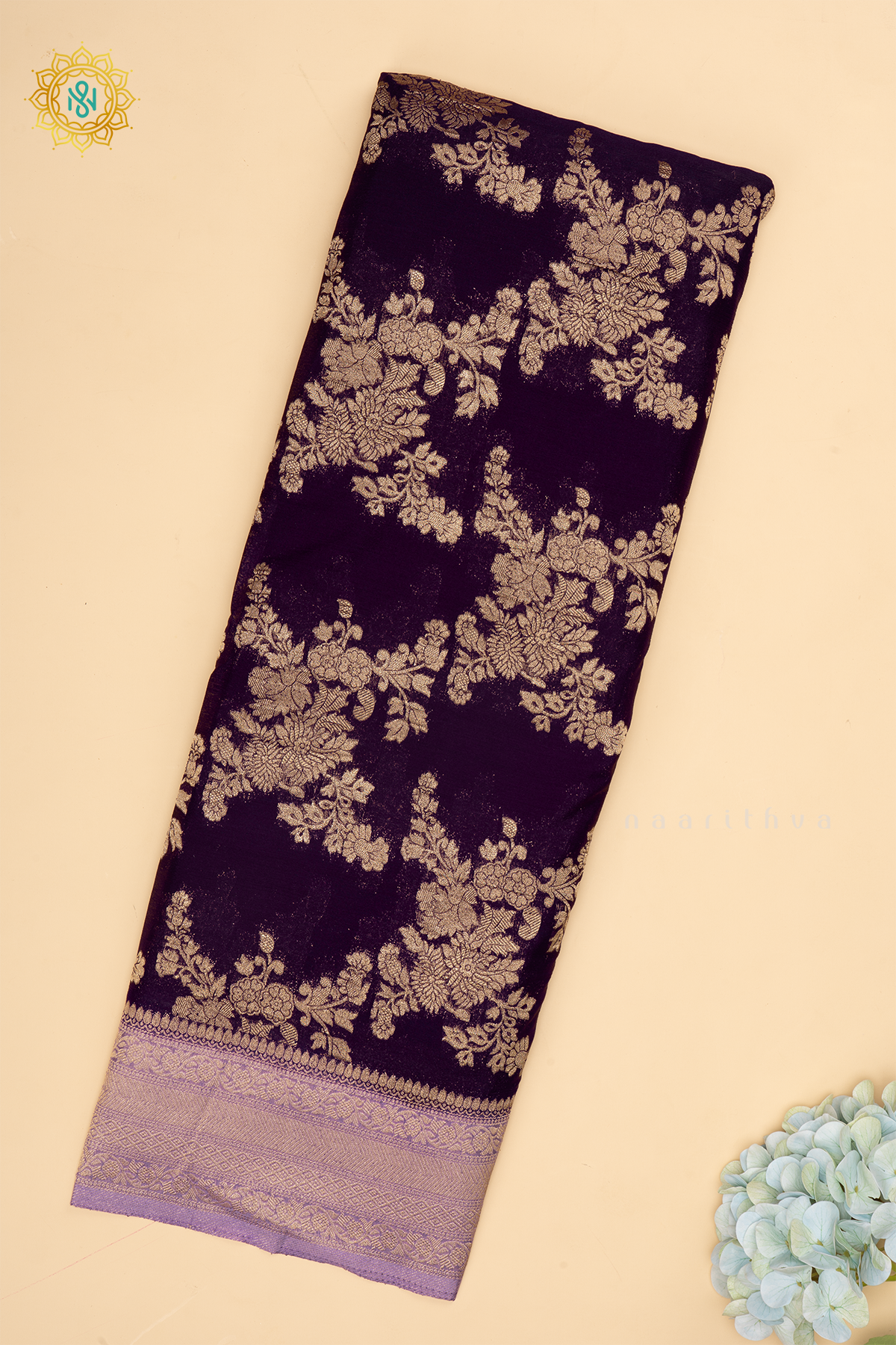 Purple With Lavender Semi Crepe Georgette Saree With Zari Woven Floral Brocade Weaves And Zari Woven Contrast Border