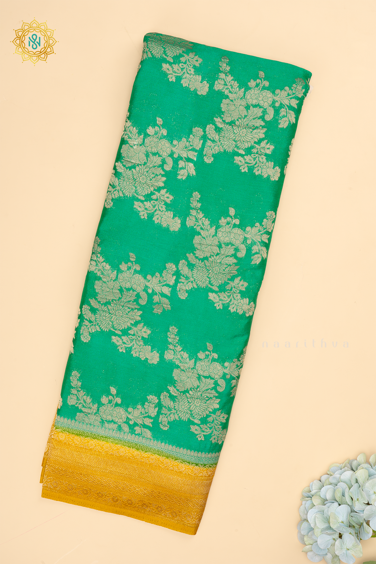 Aqua Green With Yellow Semi Crepe Georgette With Zari Woven Floral Brocade Weaves And Zari Woven Contrast Border