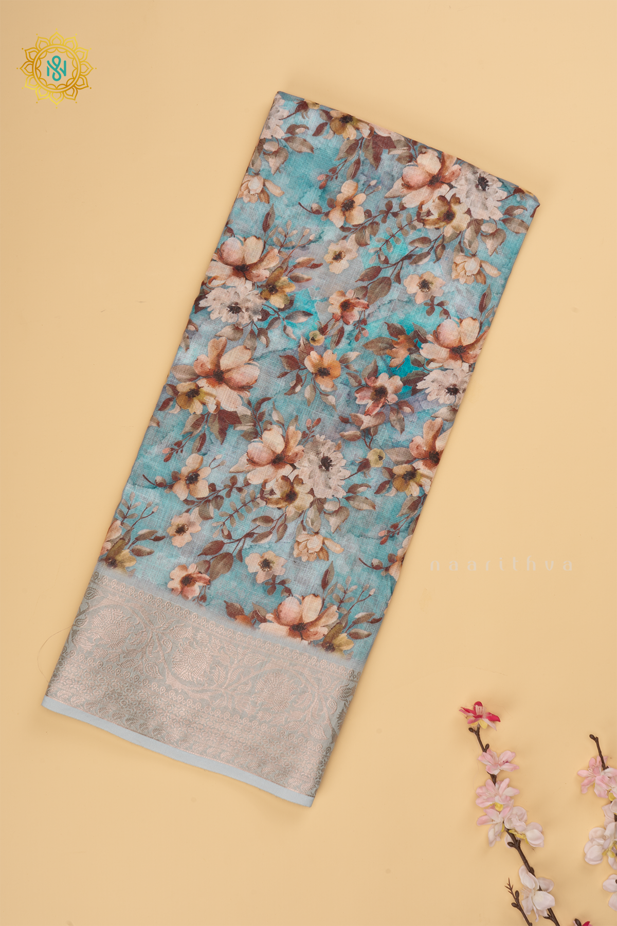 Light Blue Linen by Cotton Saree with Floral Printed Body and Zari Border