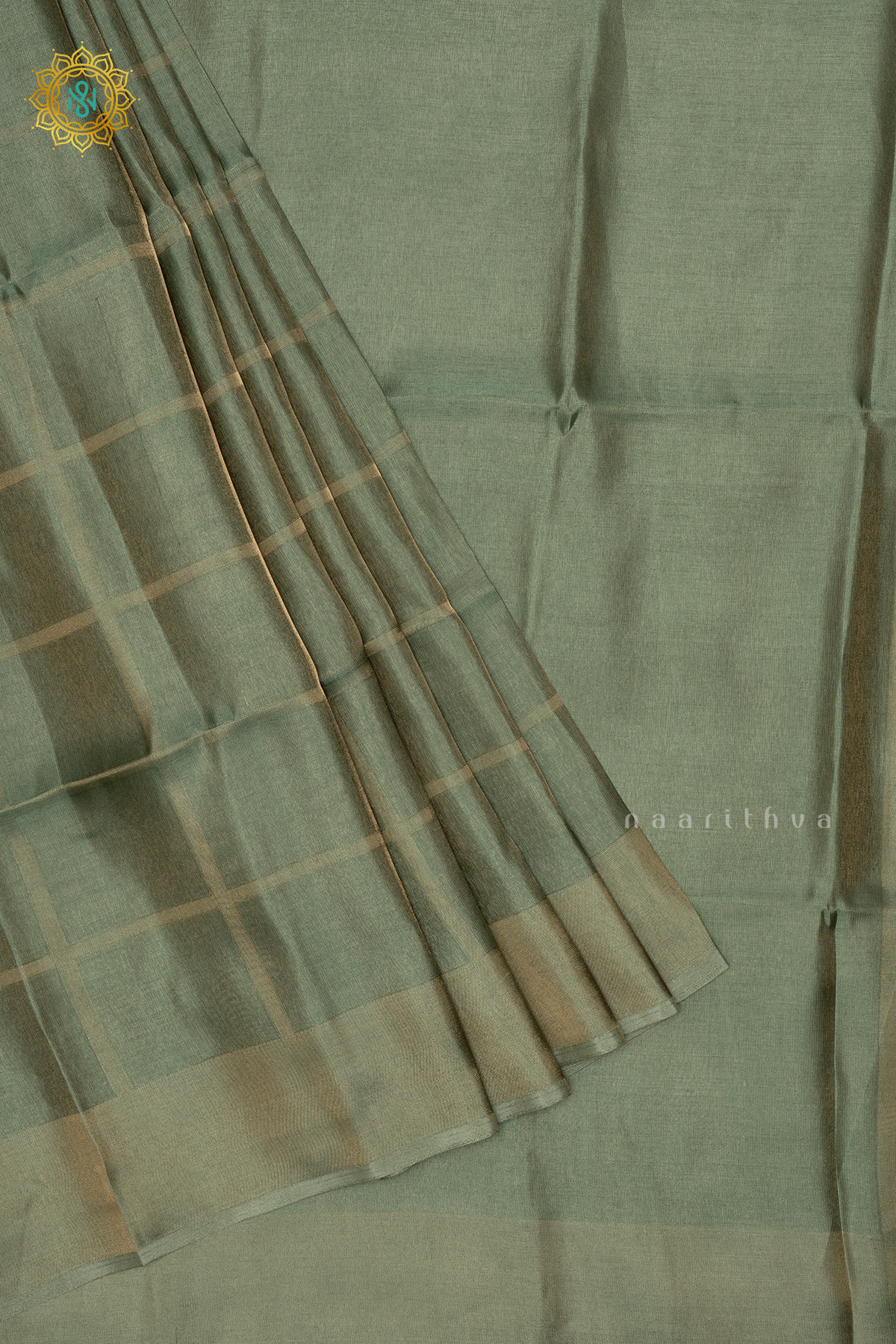 Green Semi Tissue Saree With Plain Tissue Body And Border