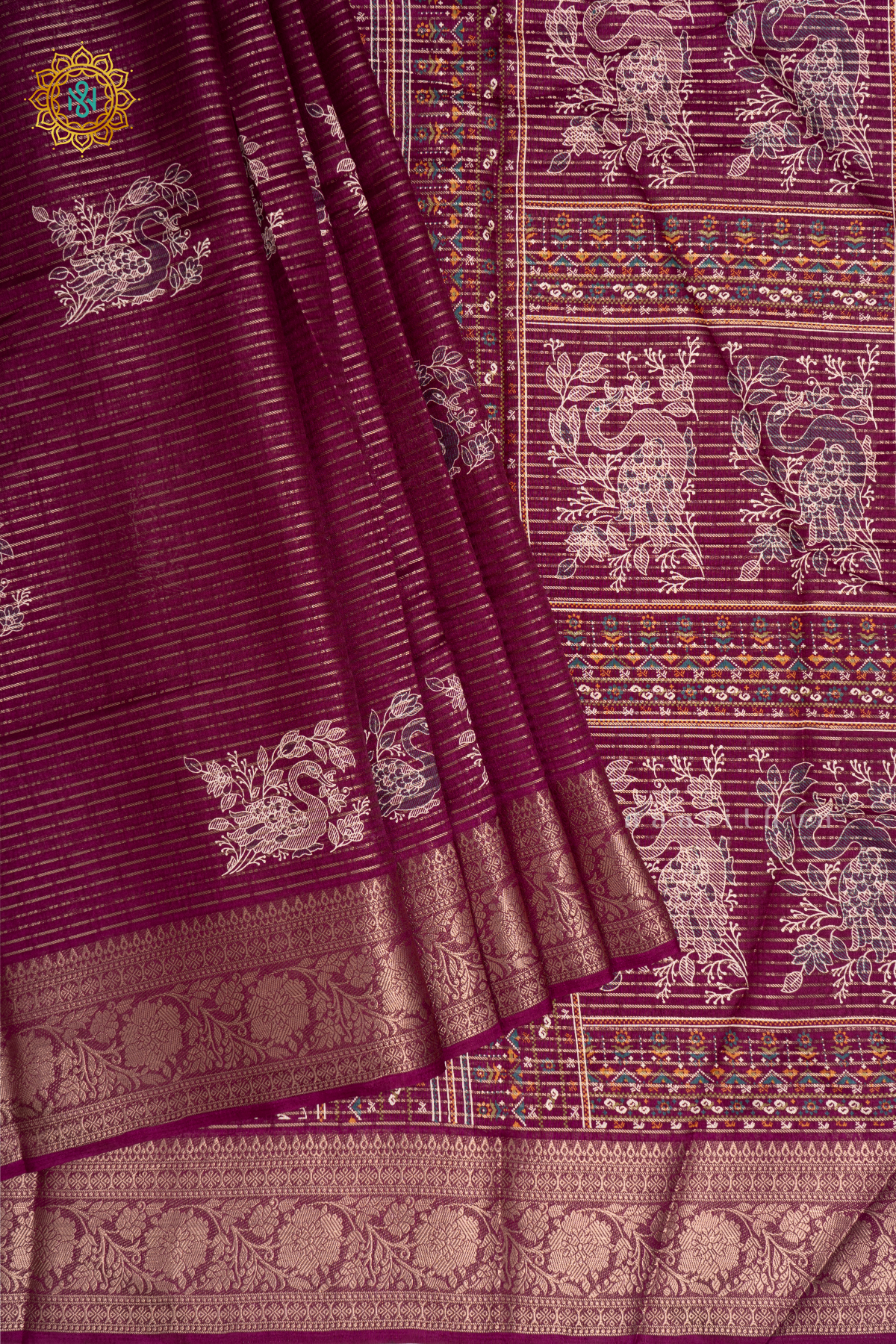 Wine Dola Silk Saree With Allover Printed Buttas And Zari Stripes With Zari Border
