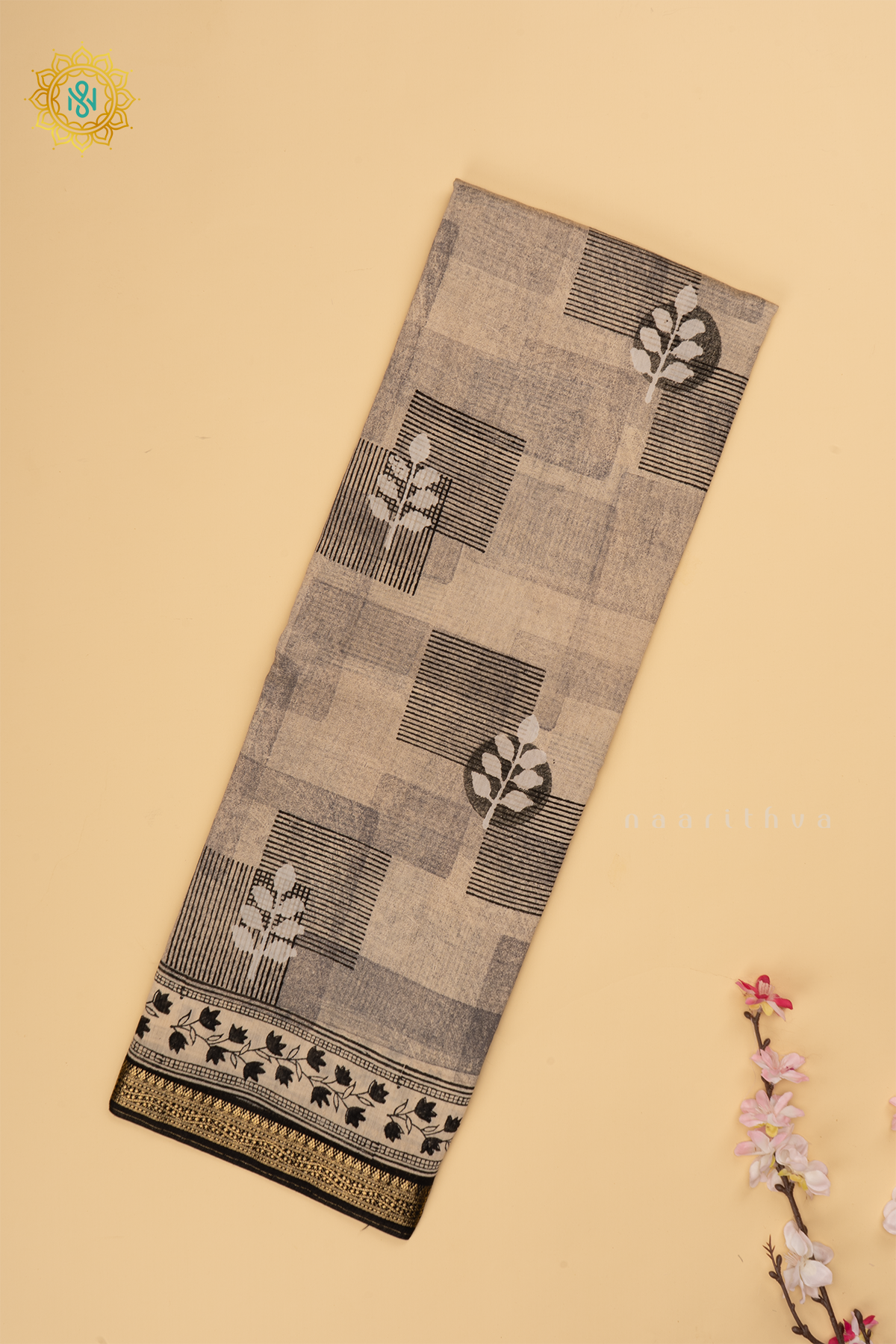 Black Butter Crepe Saree with All-Over Printed Body and Zari Border