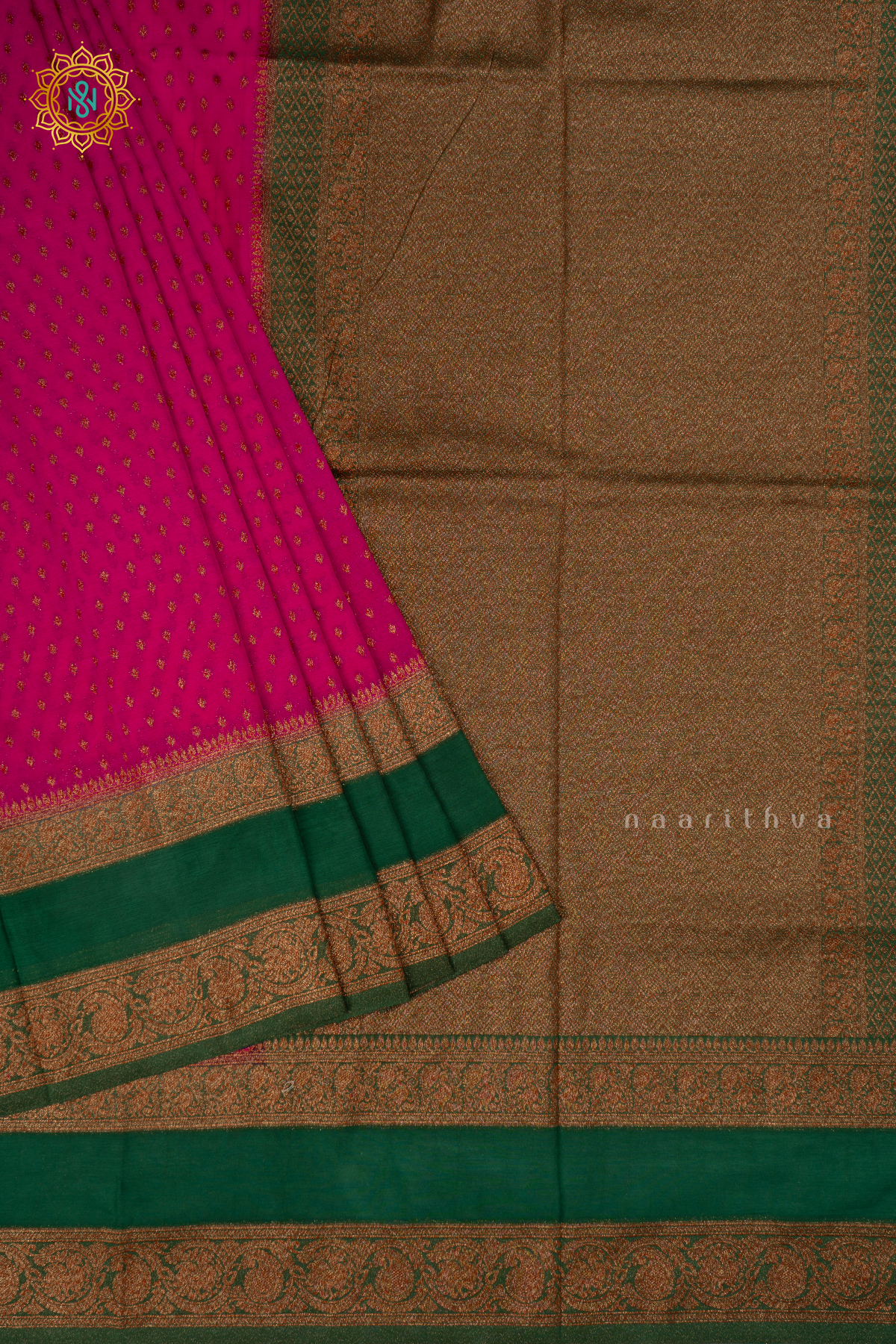 Pink With Green Semi Georgette Saree With Zari Buttas All Over And Contrast Zari Gap Border