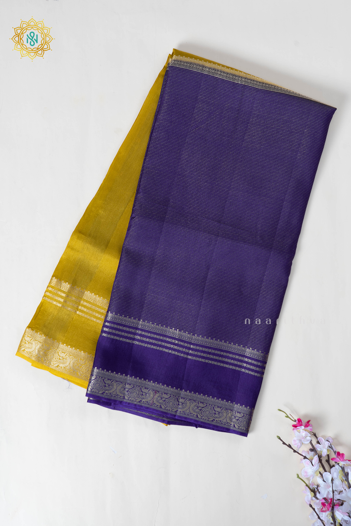 Lemon Yellow With Purple Semi Crepe Silk Saree With Zari Stripes On The Body With Bentext Border In Half & Half Pattern