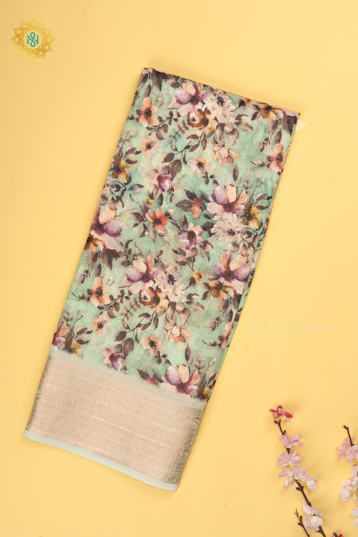 Pista Green Linen by Cotton Saree with Floral Printed Body and Zari Border