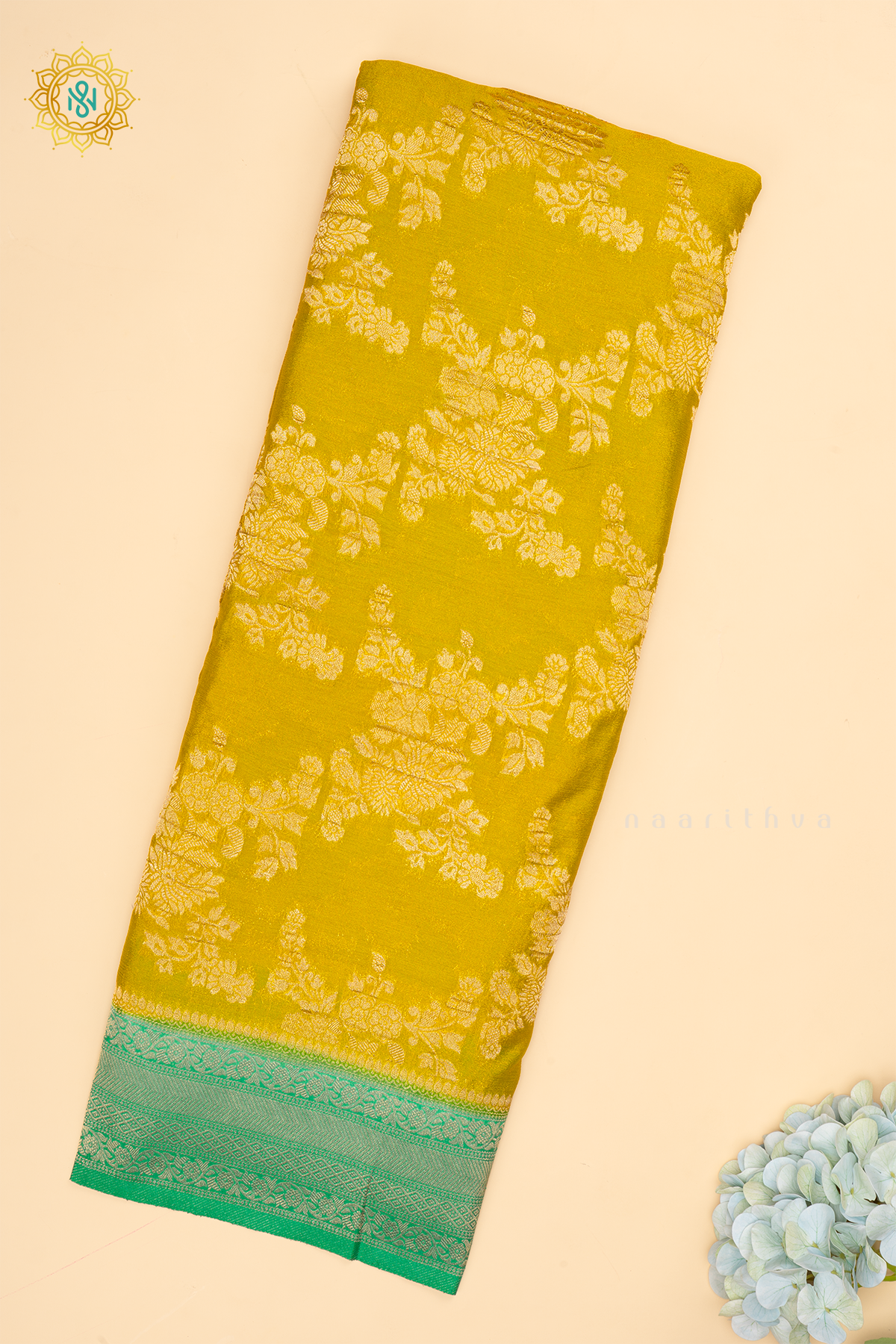 Yellow With Aqua Green Semi Crepe Georgette With Zari Woven Floral Brocade Weaves And Zari Woven Contrast Border