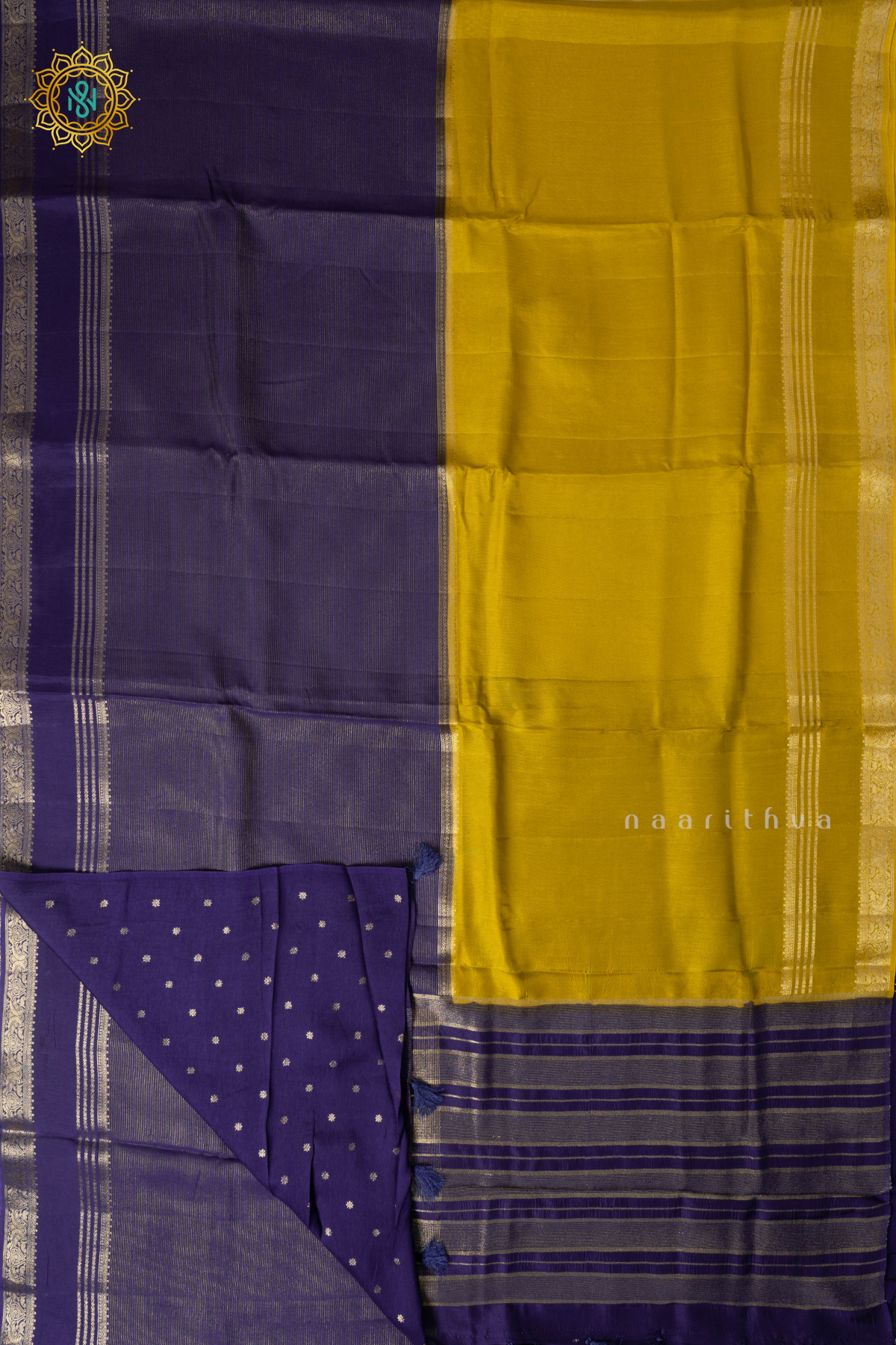 Lemon Yellow With Purple Semi Crepe Silk Saree With Zari Stripes On The Body With Bentext Border In Half & Half Pattern