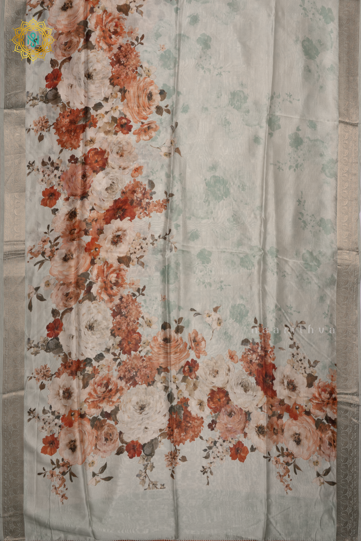 Light Blue Organza Crepe Saree With Floral Prints On The Body And Zari Border