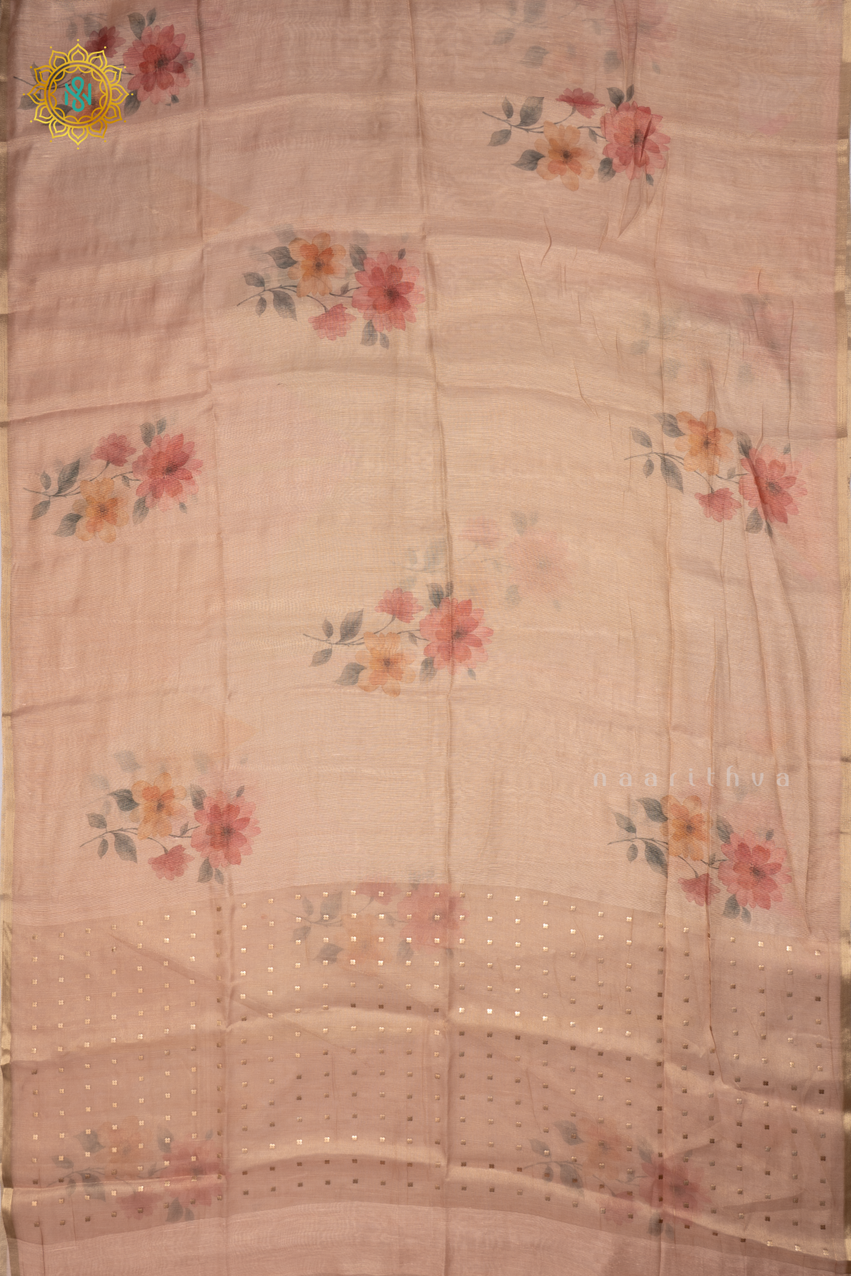 Peach Linen Tissue Saree With Floral Prints On The Body And Tissue Border