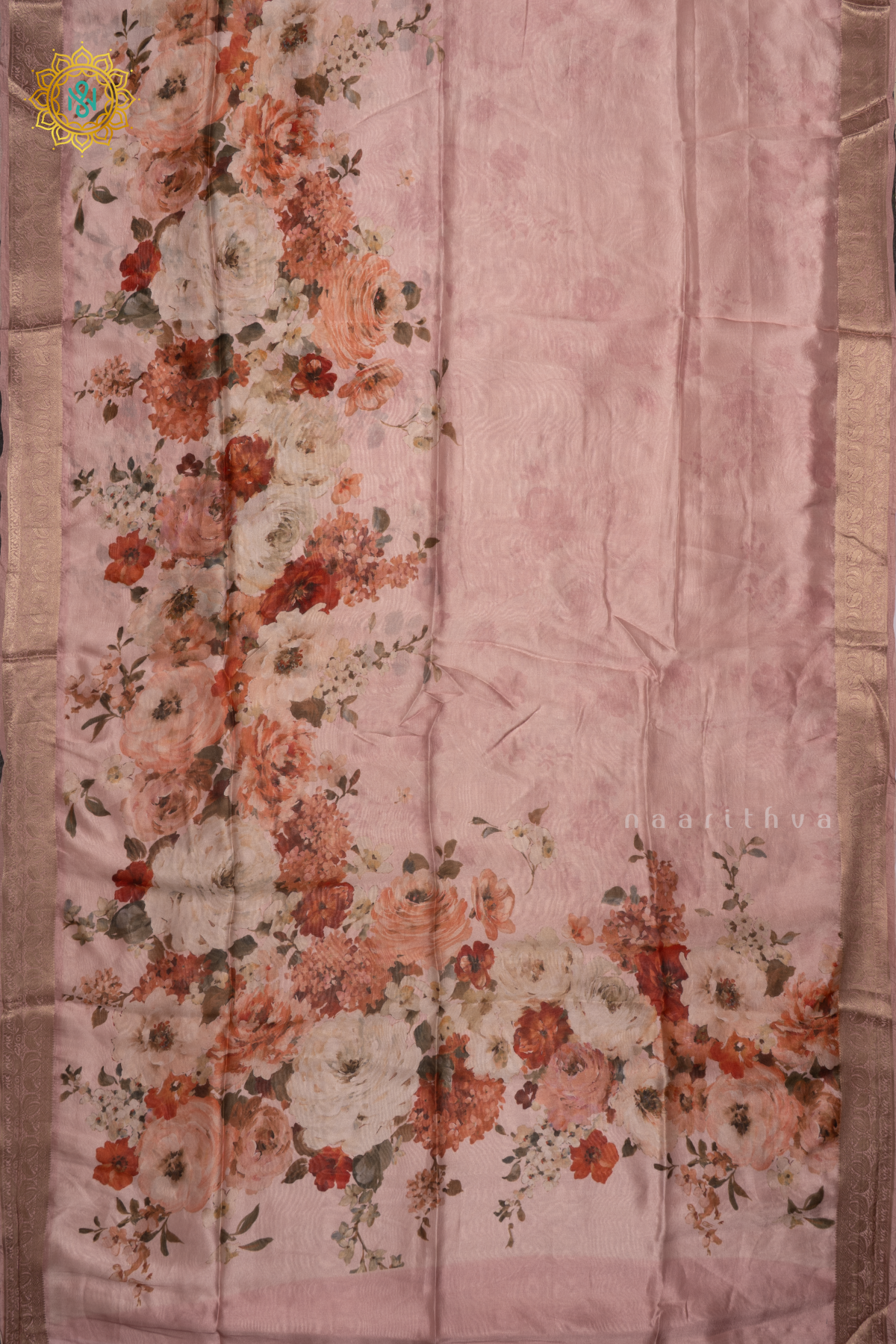 Light Pink Organza Crepe Saree With Floral Prints On The Body And Zari Border