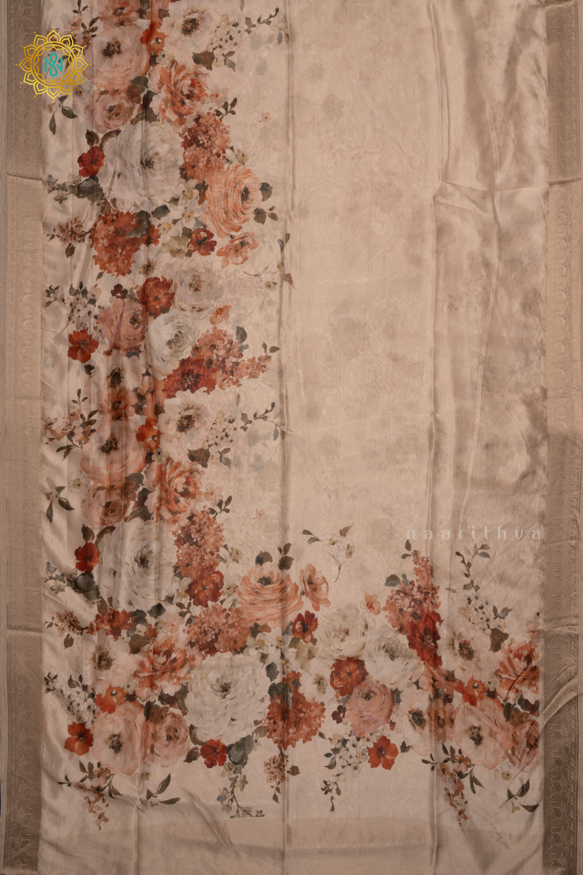 Light Peach Organza Crepe Saree With Floral Prints On The Body And Zari Border