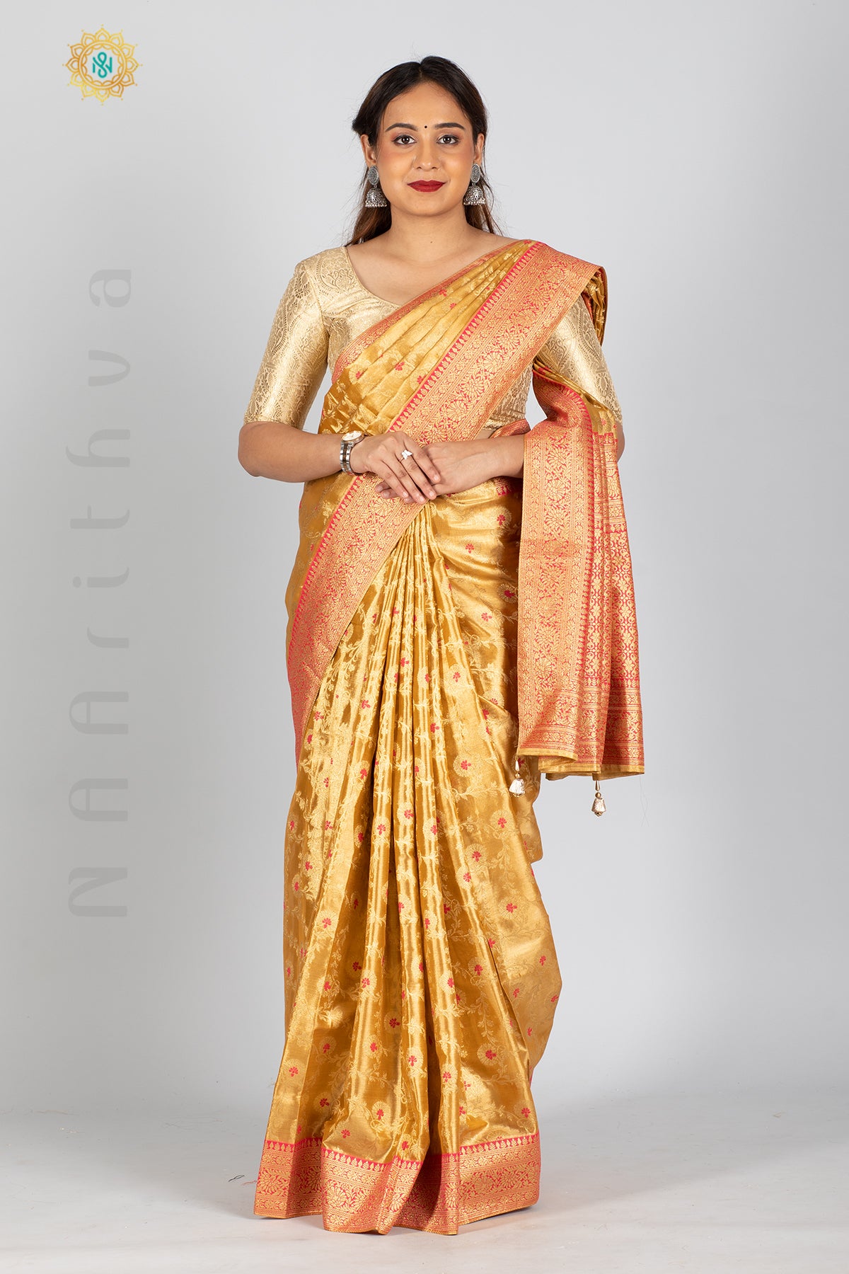 GOLD TISSUE SILK IN MEENA BUTTAS ALLOVER THE BODY WITH ZARI WOVEN PALLU & TISSUE BLOUSE