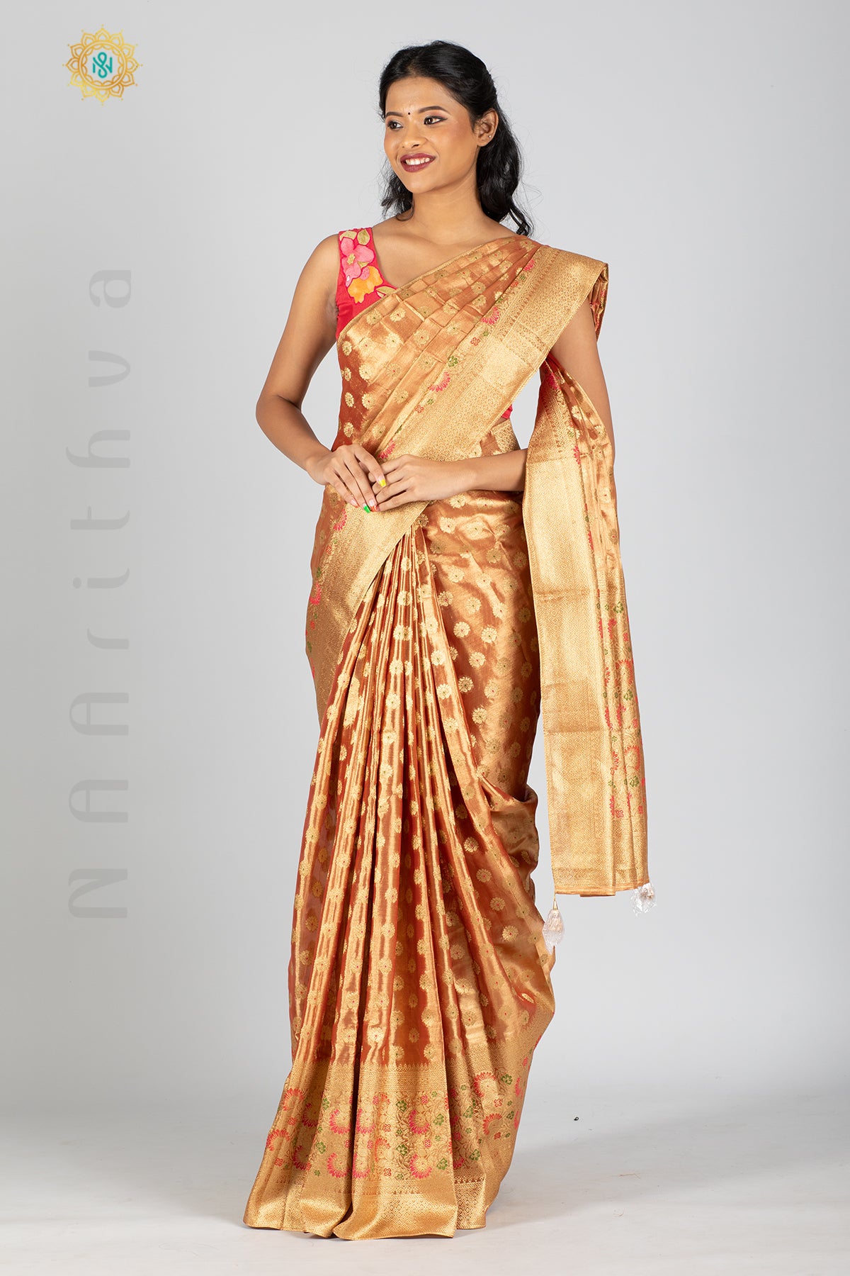 ROSE GOLD TISSUE SILK IN MEENA BUTTAS ALLOVER THE BODY WITH ZARI WOVEN PALLU & TISSUE BLOUSE