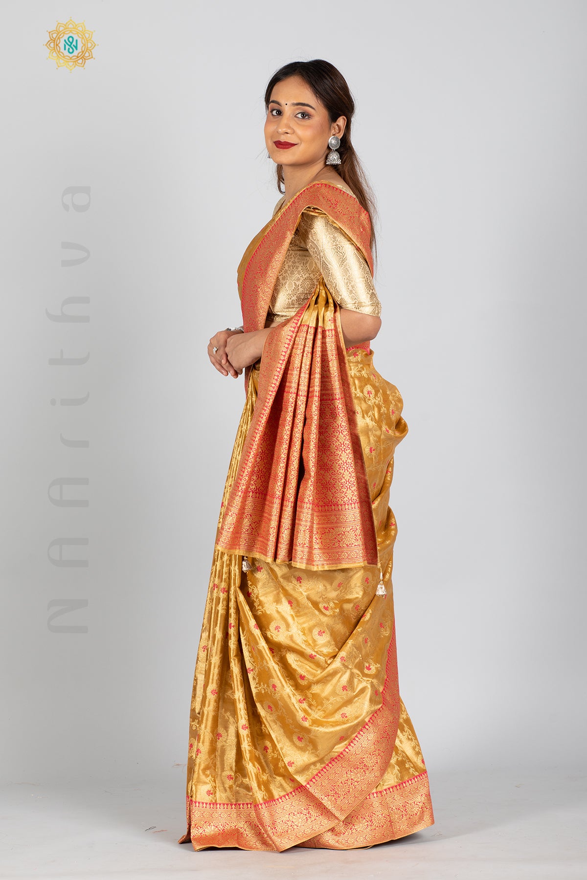 GOLD TISSUE SILK IN MEENA BUTTAS ALLOVER THE BODY WITH ZARI WOVEN PALLU & TISSUE BLOUSE