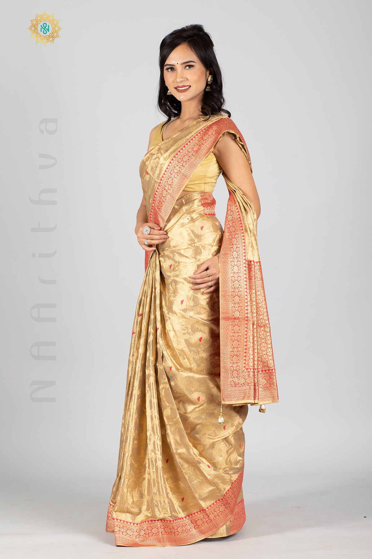 GOLD TISSUE SILK IN MEENA BUTTAS ALLOVER THE BODY WITH ZARI WOVEN PALLU & TISSUE BLOUSE