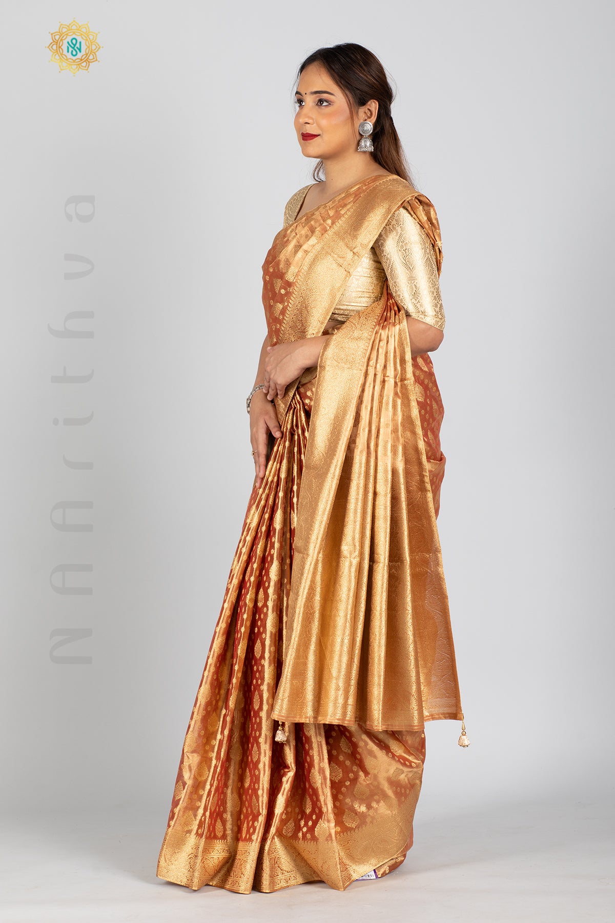 TISSUE SILK IN BROCADE WEAVES ALLOVER THE BODY WITH ZARI WOVEN PALLU & TISSUE BLOUSE