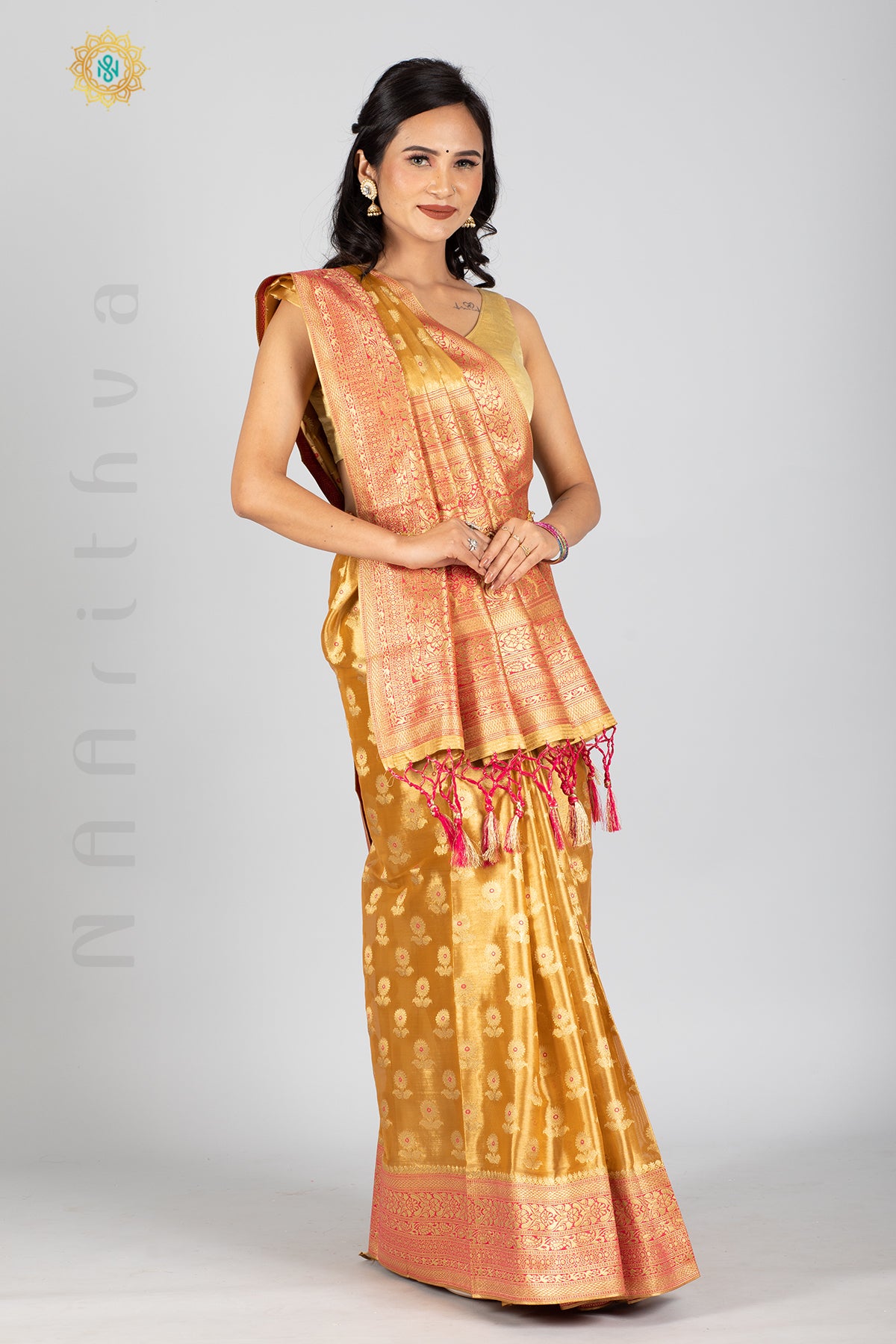 GOLD TISSUE SILK IN MEENA BUTTAS ALLOVER THE BODY WITH ZARI WOVEN PALLU & TISSUE BLOUSE