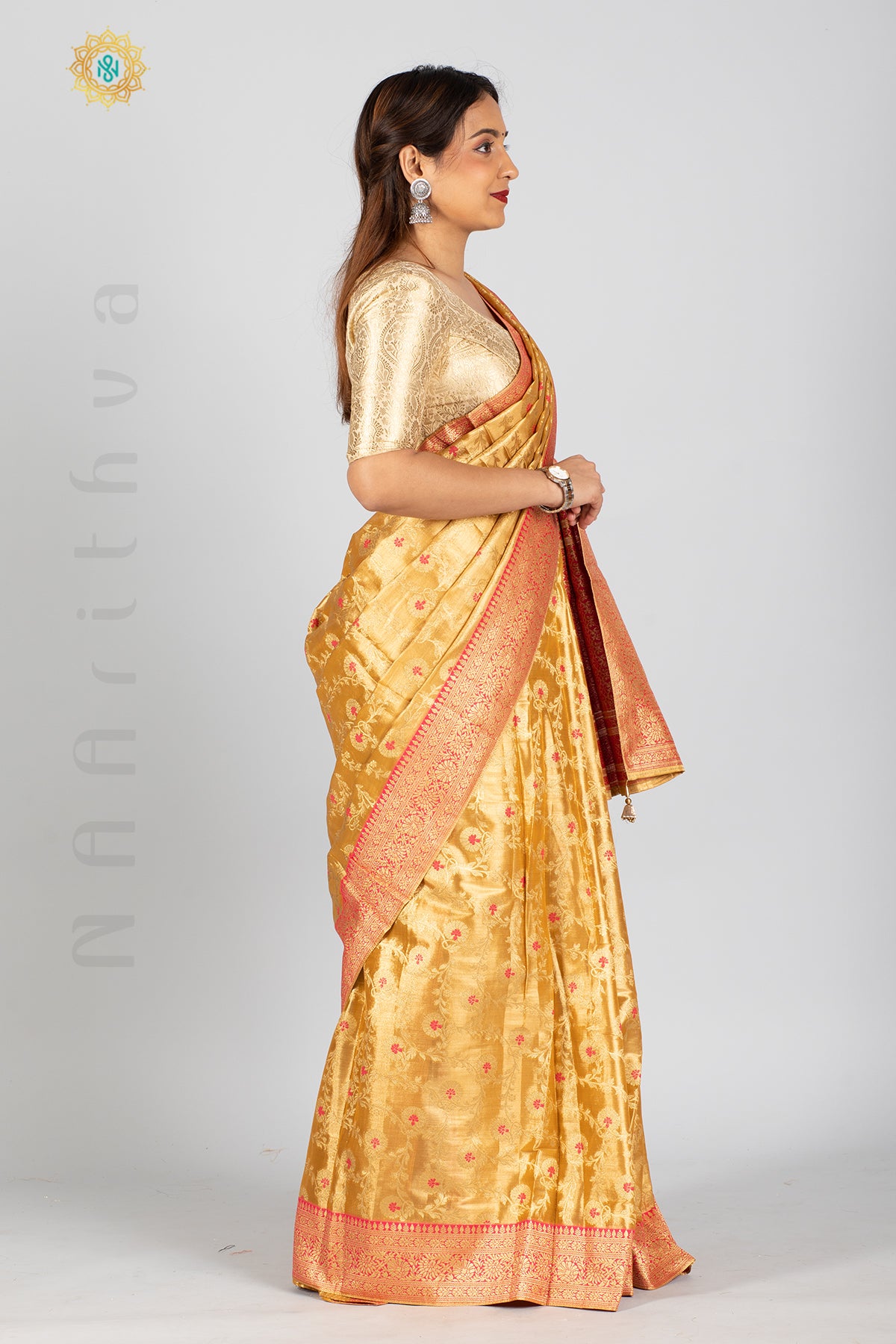 GOLD TISSUE SILK IN MEENA BUTTAS ALLOVER THE BODY WITH ZARI WOVEN PALLU & TISSUE BLOUSE