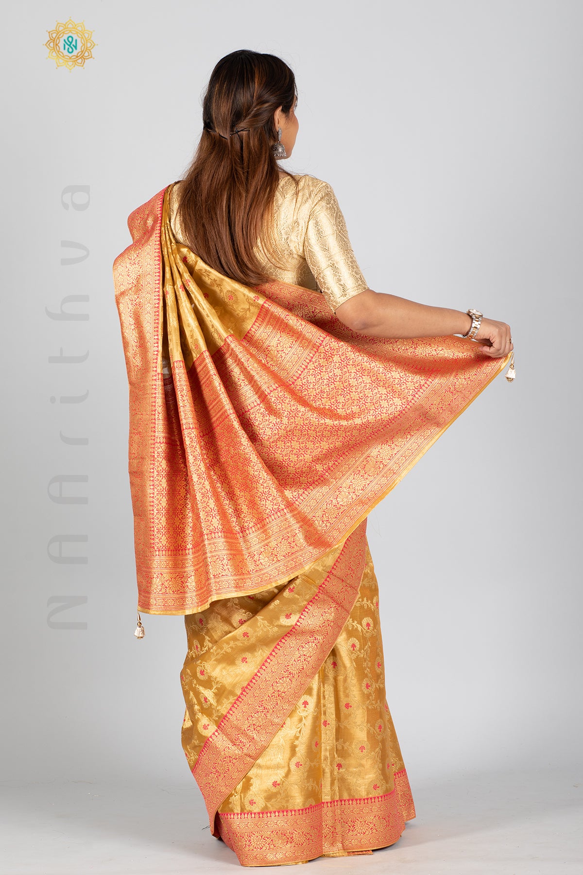 GOLD TISSUE SILK IN MEENA BUTTAS ALLOVER THE BODY WITH ZARI WOVEN PALLU & TISSUE BLOUSE