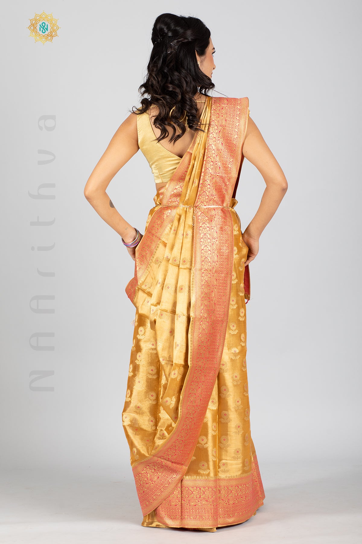 GOLD TISSUE SILK IN MEENA BUTTAS ALLOVER THE BODY WITH ZARI WOVEN PALLU & TISSUE BLOUSE