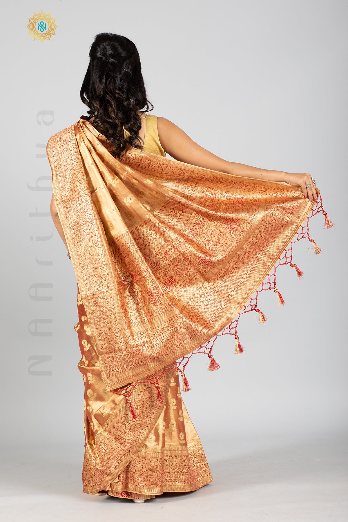 ROSE GOLD TISSUE SILK IN BROCADE WEAVES ALLOVER THE BODY WITH ZARI WOVEN PALLU & TISSUE BLOUSE