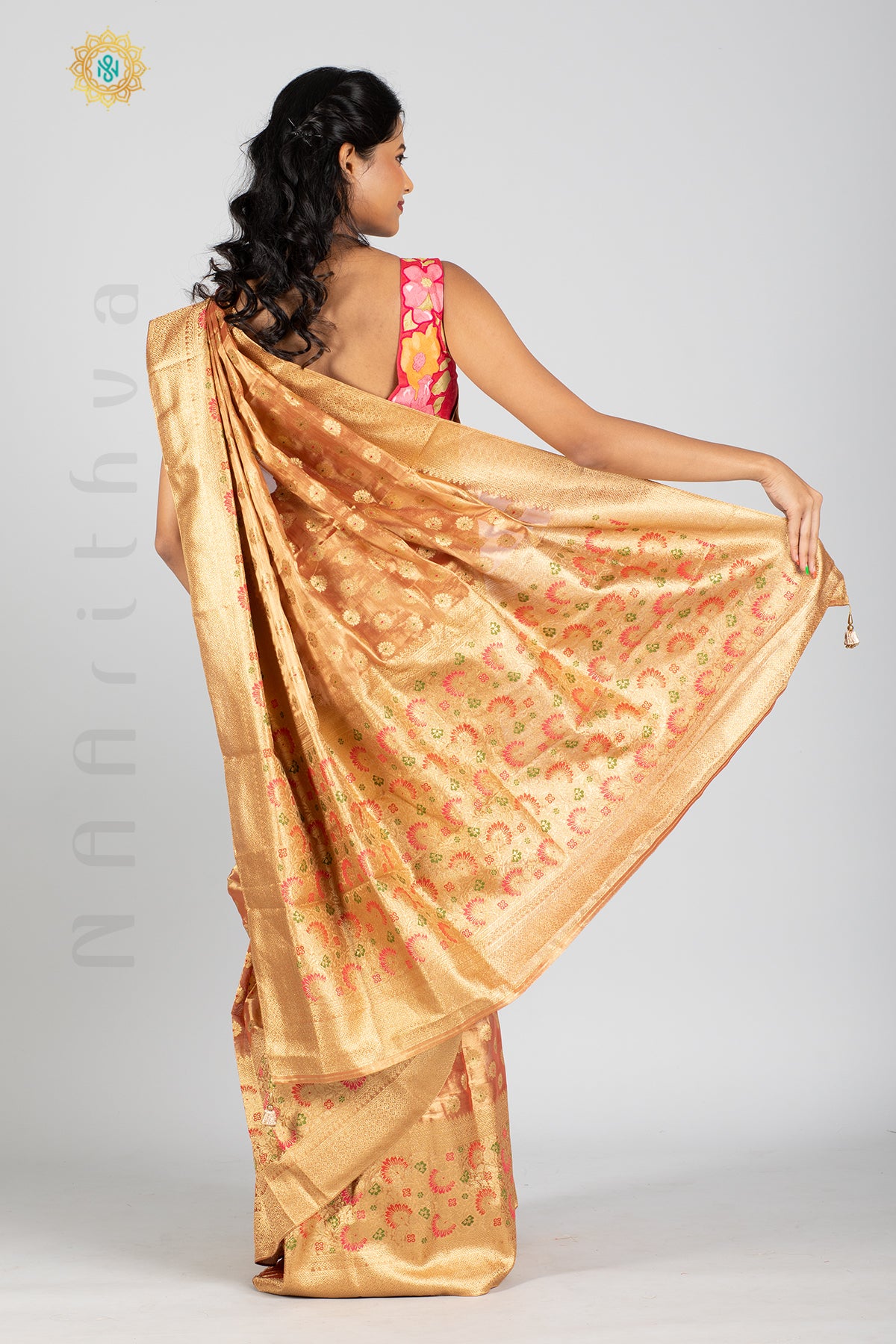 ROSE GOLD TISSUE SILK IN MEENA BUTTAS ALLOVER THE BODY WITH ZARI WOVEN PALLU & TISSUE BLOUSE