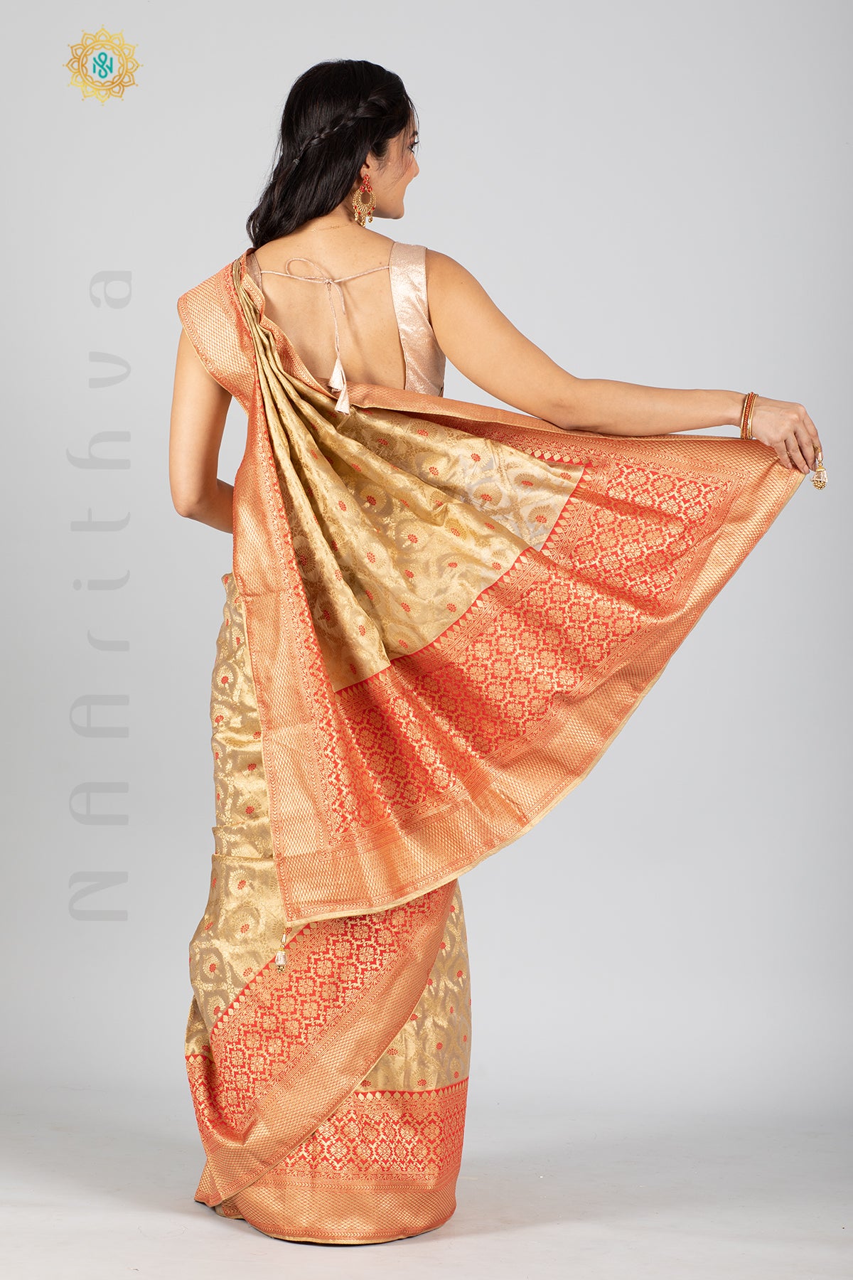 GOLD TISSUE SILK IN MEENA BUTTAS ALLOVER THE BODY WITH ZARI WOVEN PALLU & TISSUE BLOUSE