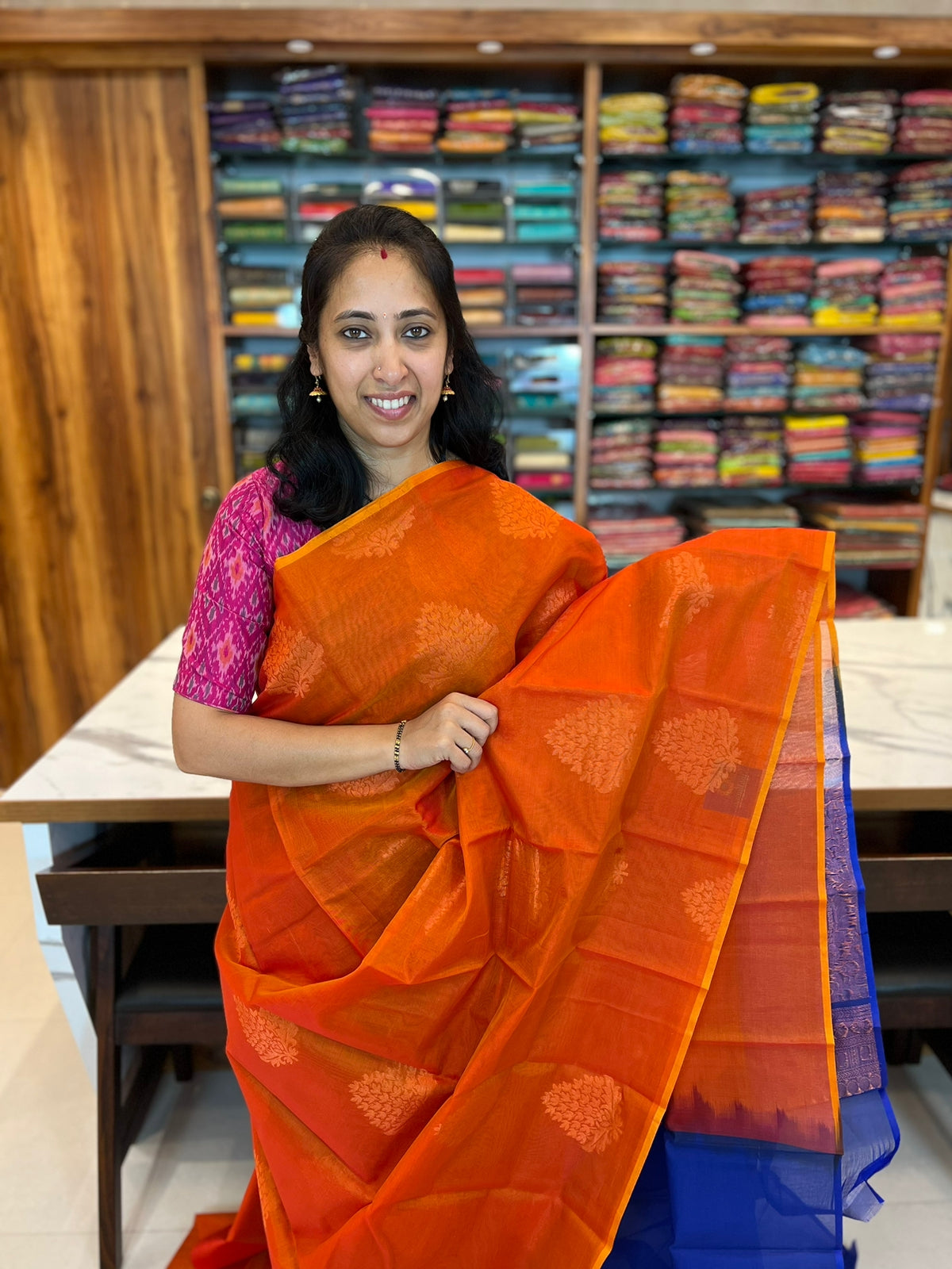 ORANGE WITH BLUE - SILK COTTON WITH ALLOVER BUTTA WITH CONTRAST PALLU