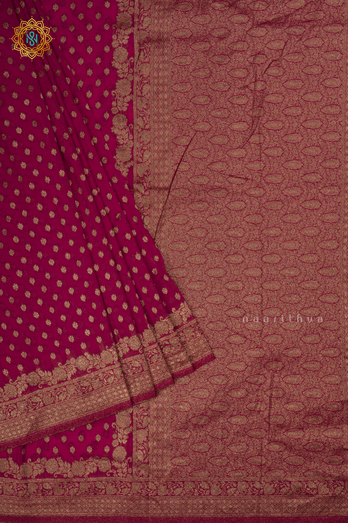 Pink - Semi georgette saree with allover zari buttas and zari border