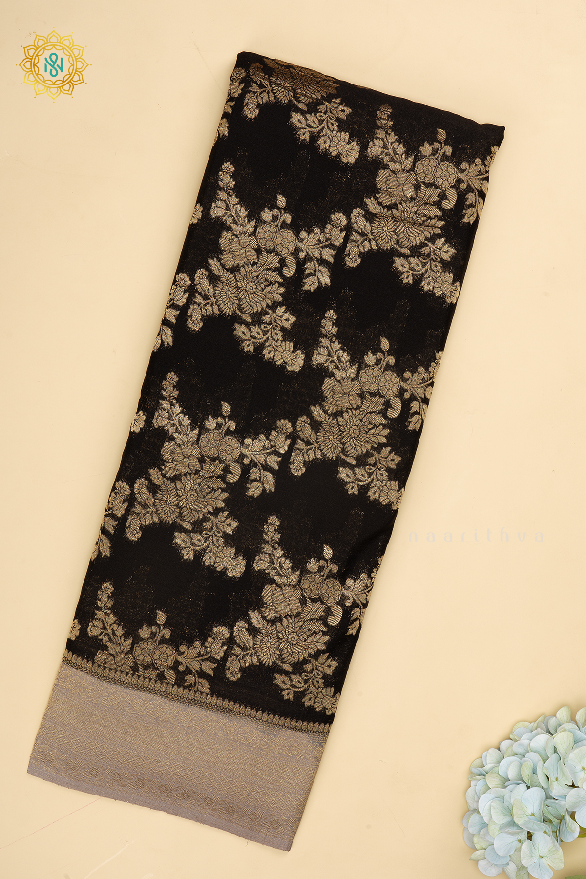 Black With Grey Semi Crepe Georgette With Zari Woven Floral Brocade Weaves And Zari Woven Contrast Border