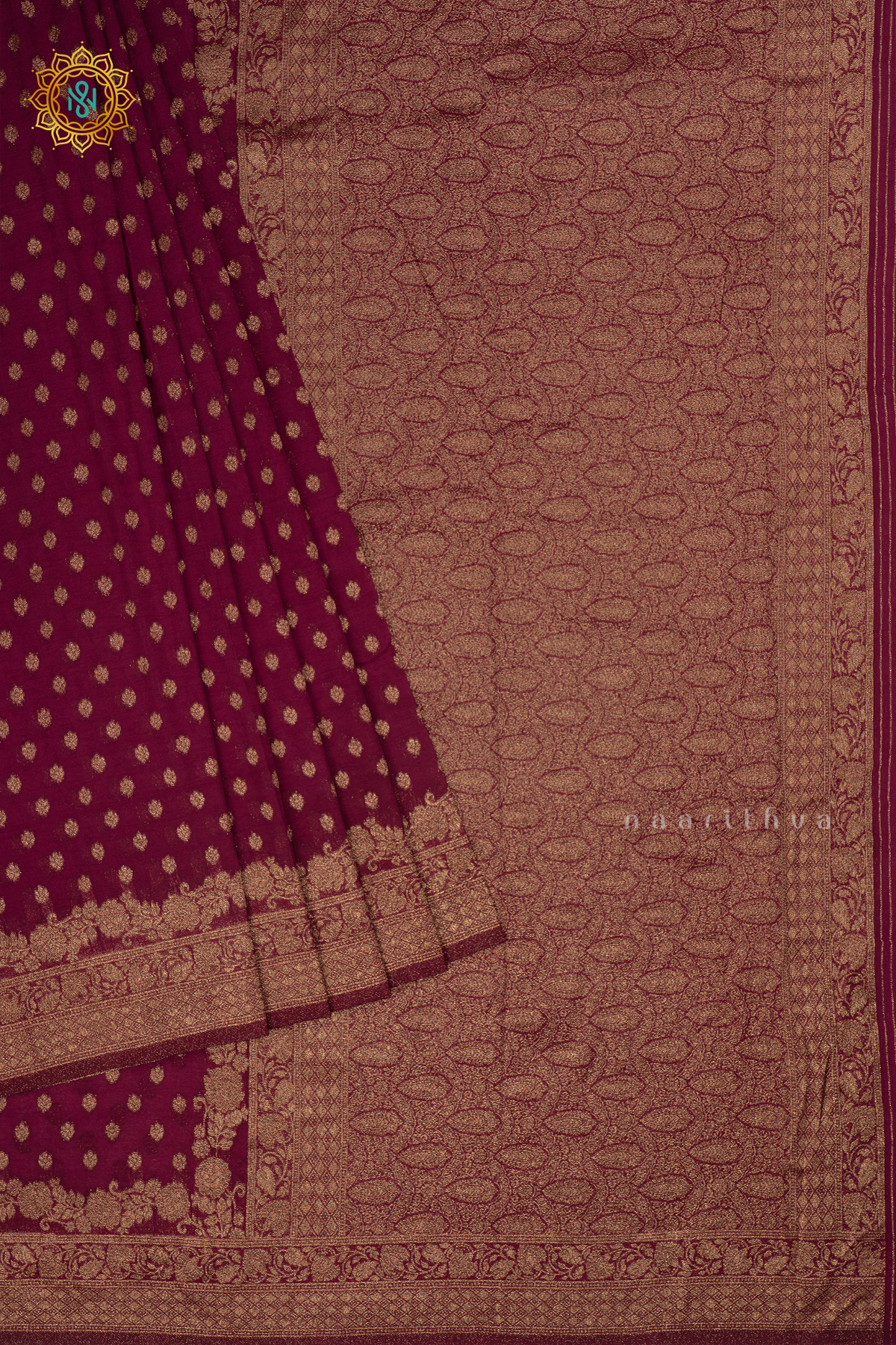 Maroon - Semi georgette saree with allover zari buttas and zari border