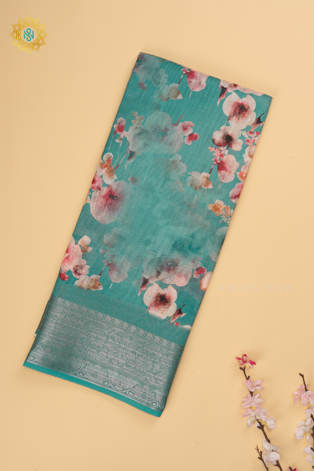 Aqua Blue Linen by Cotton Saree with Floral Printed Body and Zari Border