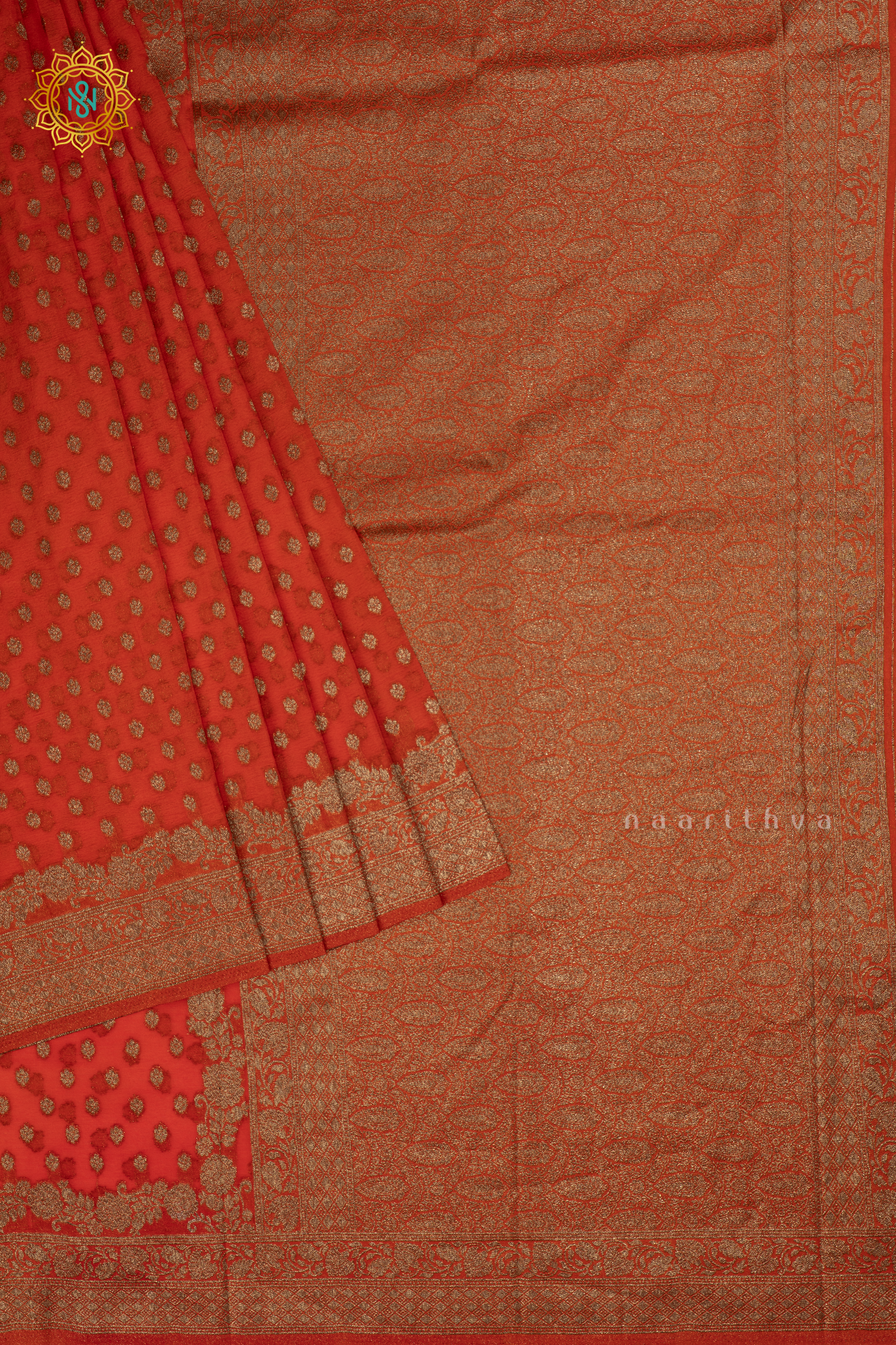 Orange - Semi georgette saree with allover zari buttas and zari border