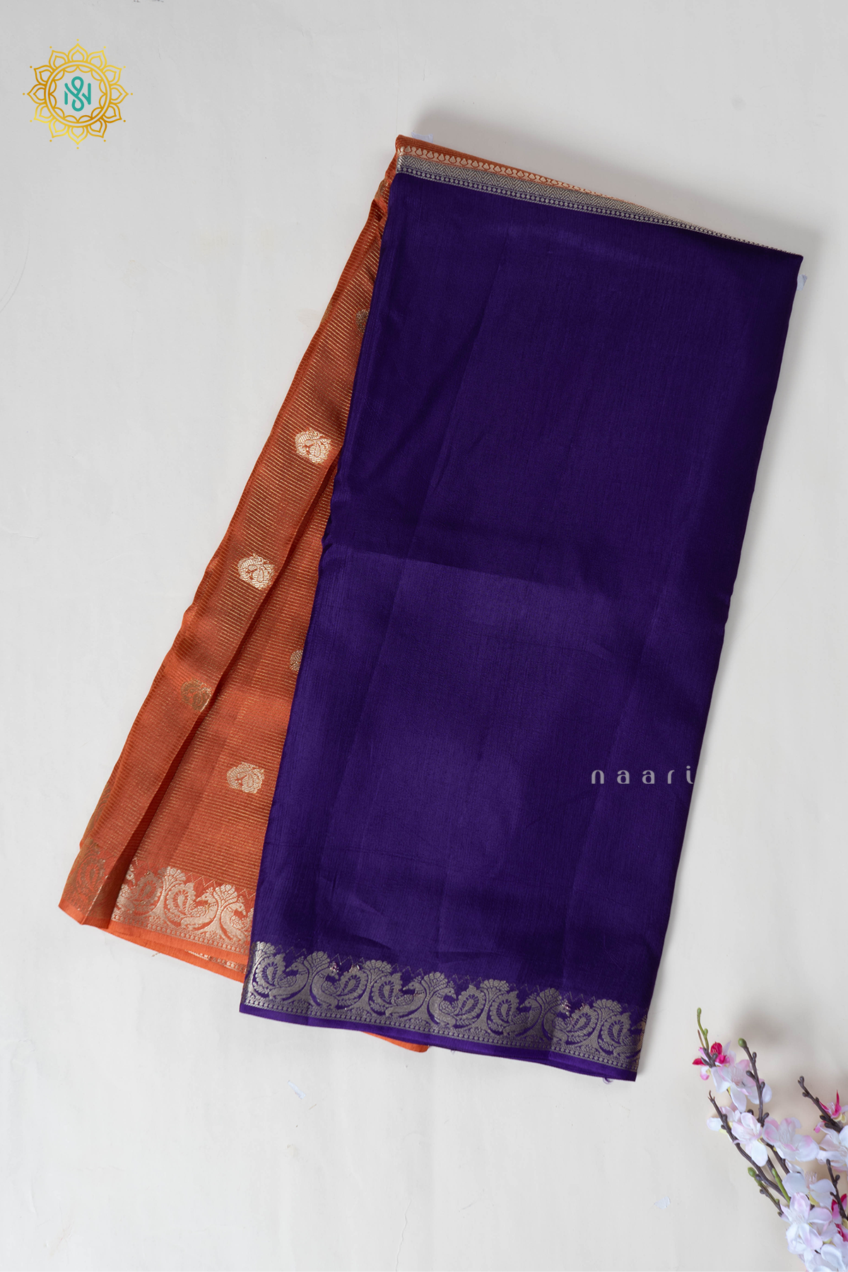 Orange With Purple Semi Crepe Silk Saree With Zari Stripes & Buttas On The Body With Half & Half Pattern