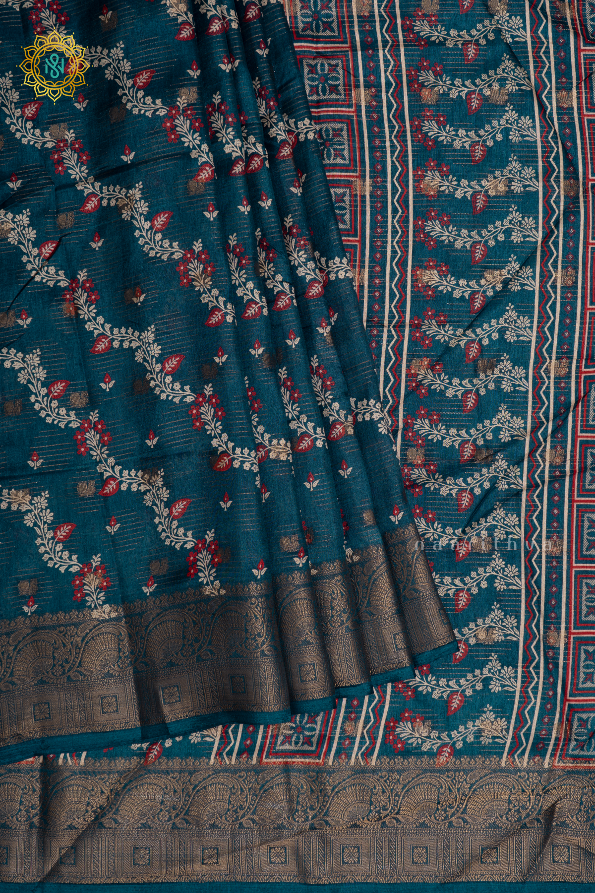 Peacock Blue Dola Silk Saree With Printed Body And Zari Border