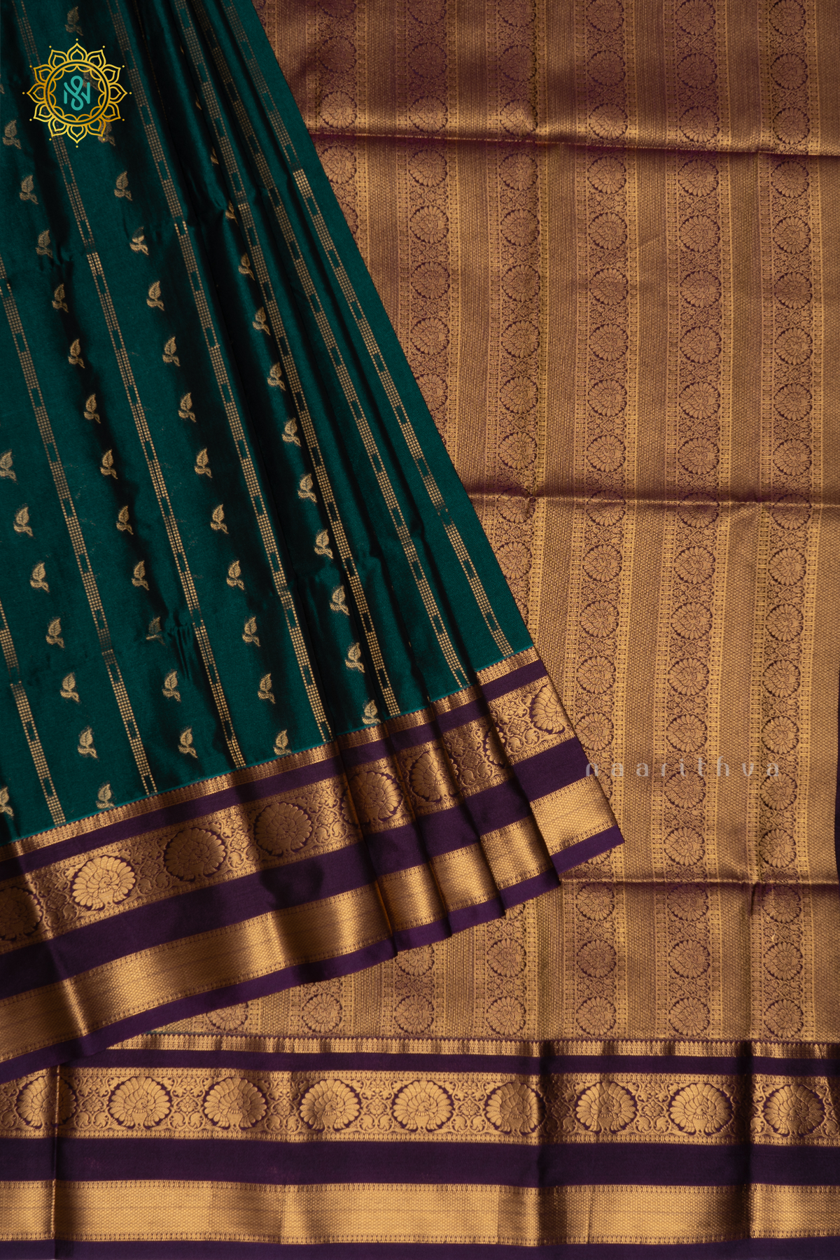 PEACOCK GREEN WITH PURPLE - SEMI KANCHI SAREE ALLOVER ZARI BUTTAS AND CONTRAST GAP BORDER