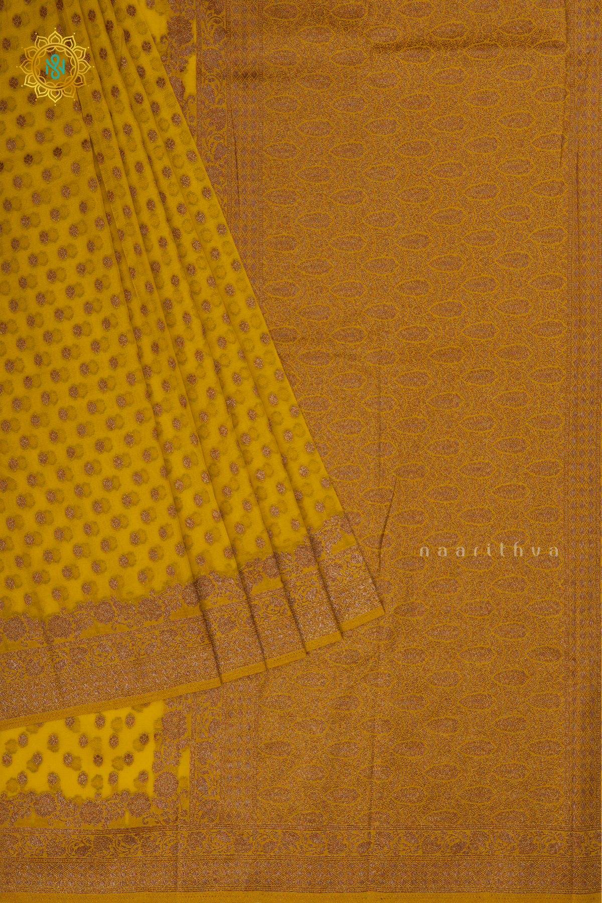 Yellow - Semi georgette saree with allover zari buttas and zari border