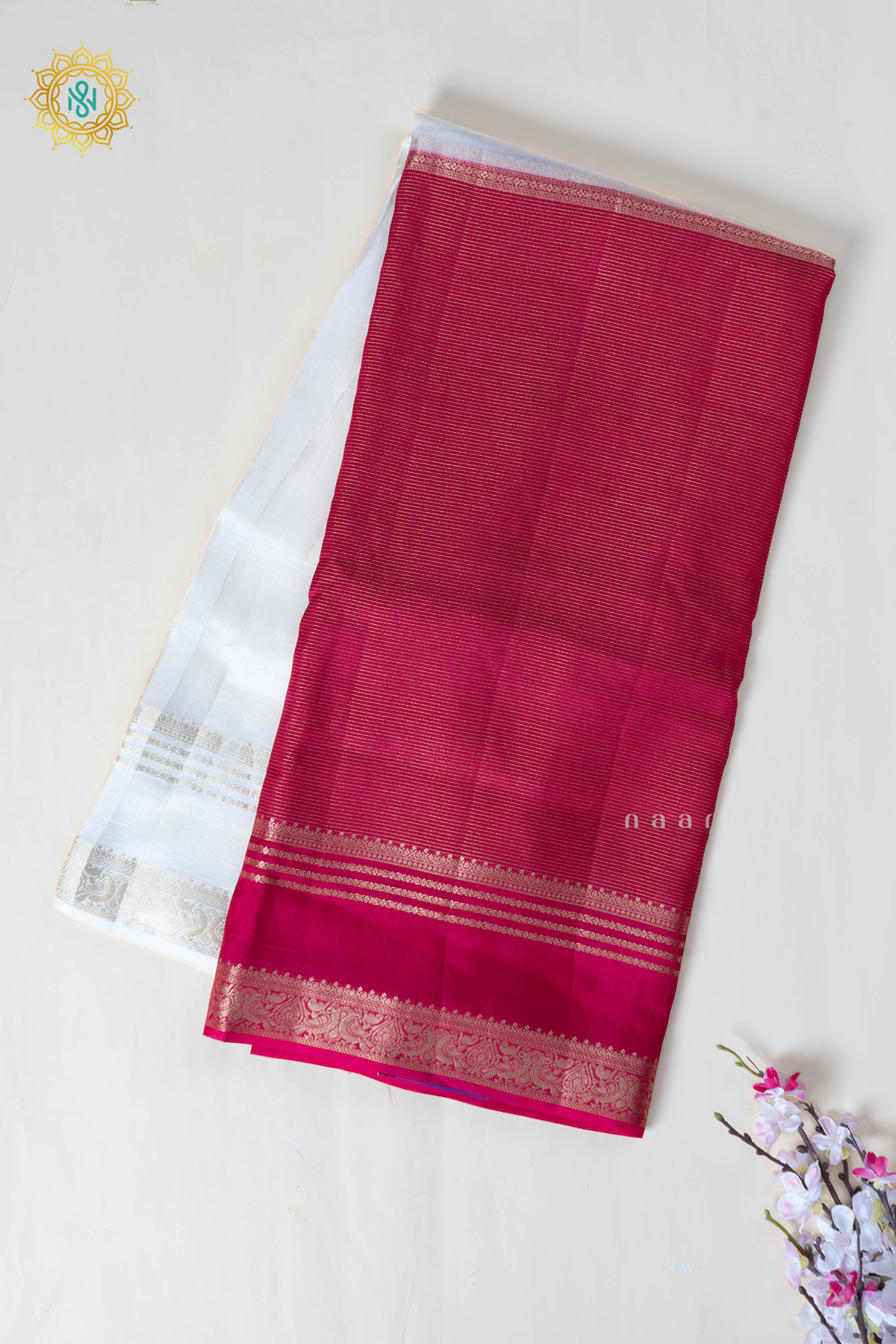 White With Pink Semi Crepe Silk Saree With Zari Stripes On The Body With Bentext Border In Half & Half Pattern