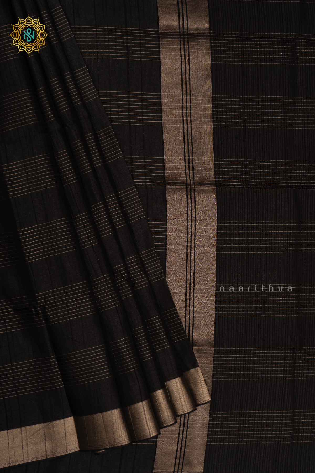 Black Semi Tussar Silk Saree With Zari Stripes On The Body And Zari Border