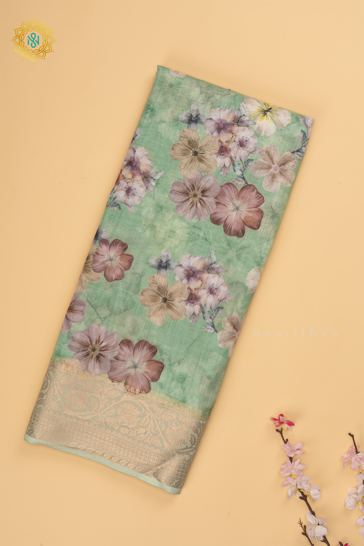 Light Green Linen by Cotton Saree with Floral Printed Body and Zari Border