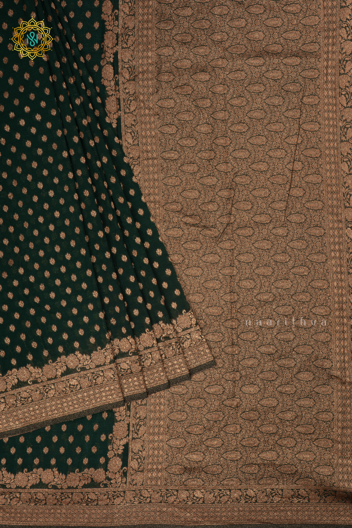 Bottle green - Semi georgette saree with allover zari buttas and zari border