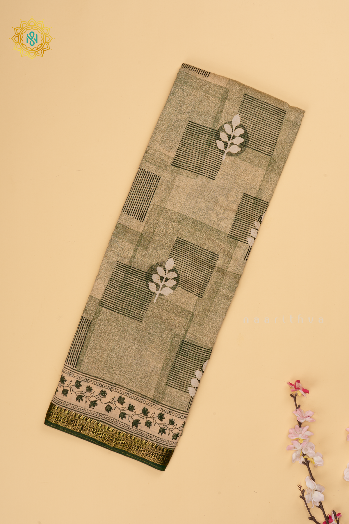Green Butter Crepe Saree with All-Over Printed Body and Zari Border