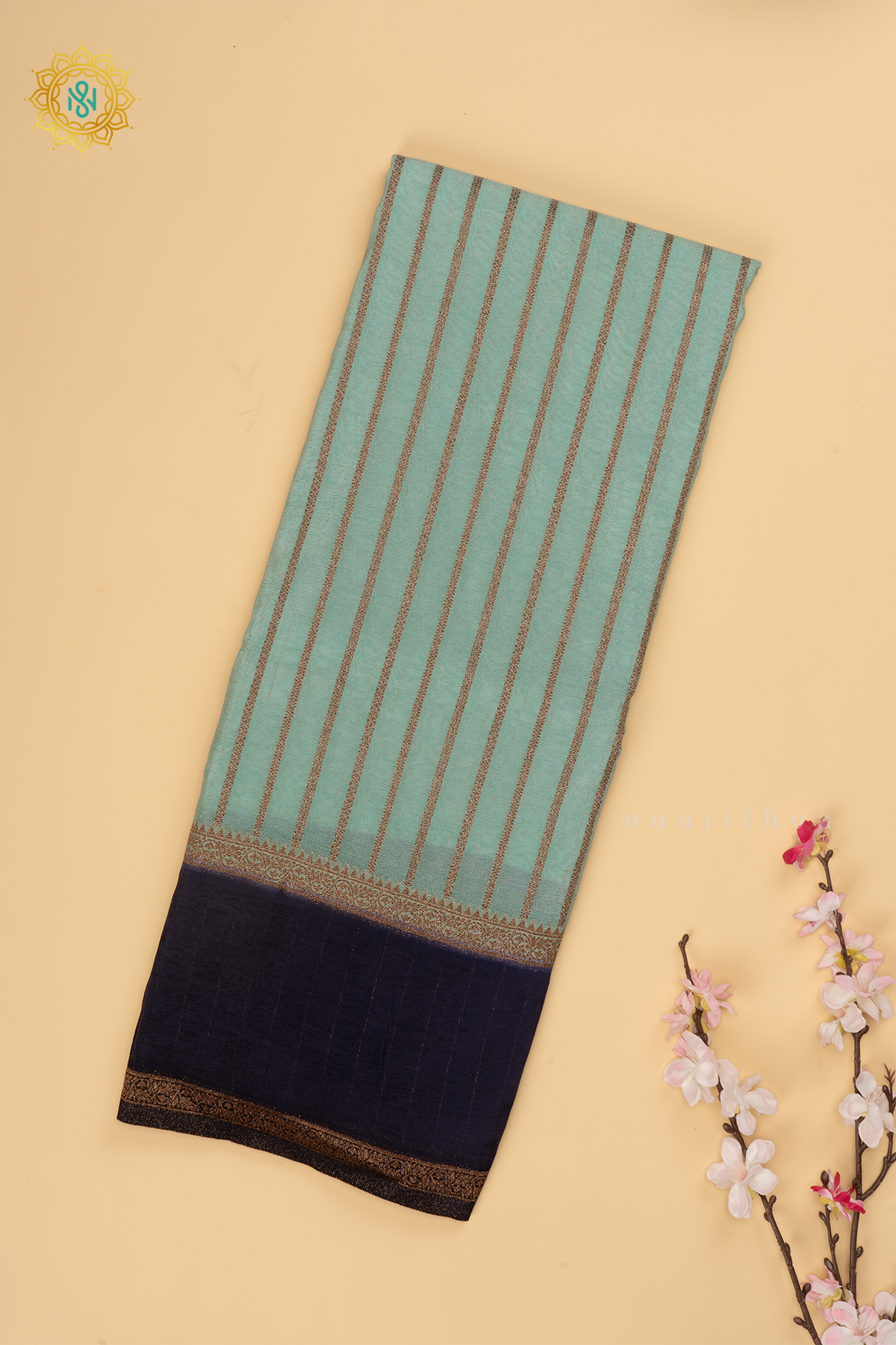 Aqua Blue with Navy Blue Semi Chiffon Georgette Saree with Allover Zari Stripes and Zari Gap Border