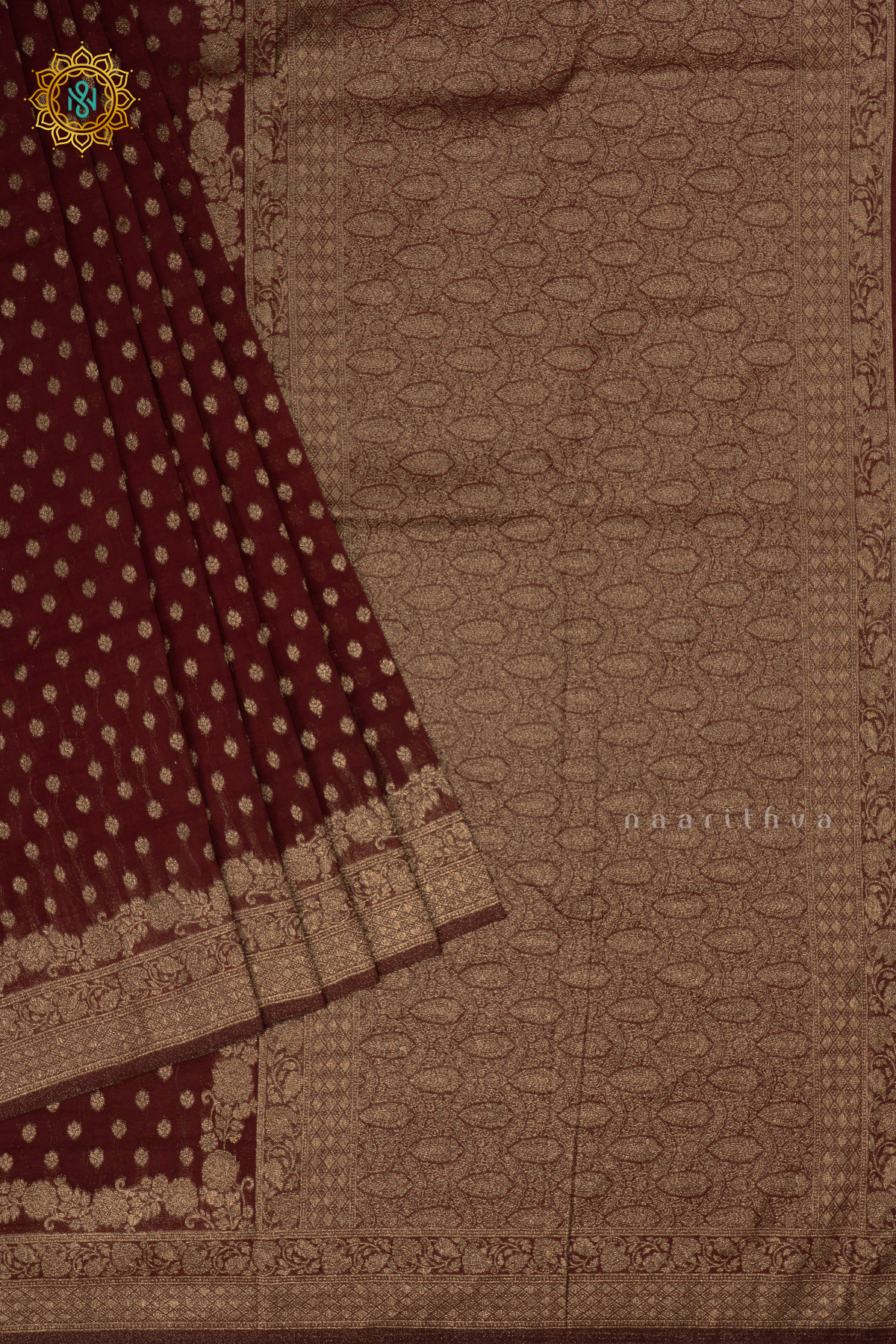 Brown - Semi georgette saree with allover zari buttas and zari border