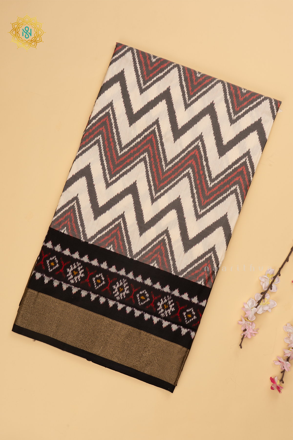 White with Black Ikkat Pure Silk Saree with Patola Printed Body and Zari Border