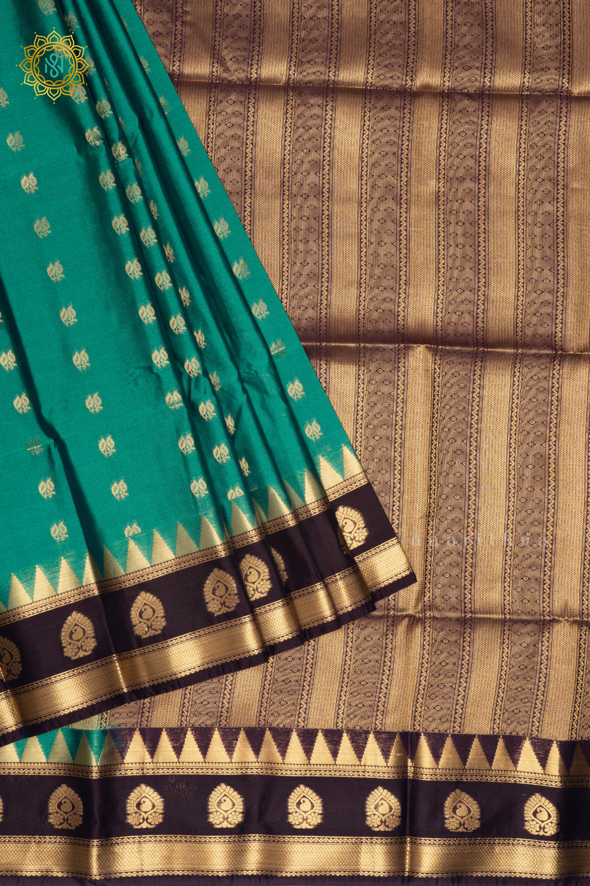 AQUA GREEN WITH DEEP PURPLE - SEMI SOFT SILK SAREE ALLOVER ZARI BUTTAS AND CONTRAST TEMPLE RISING GAP BORDER