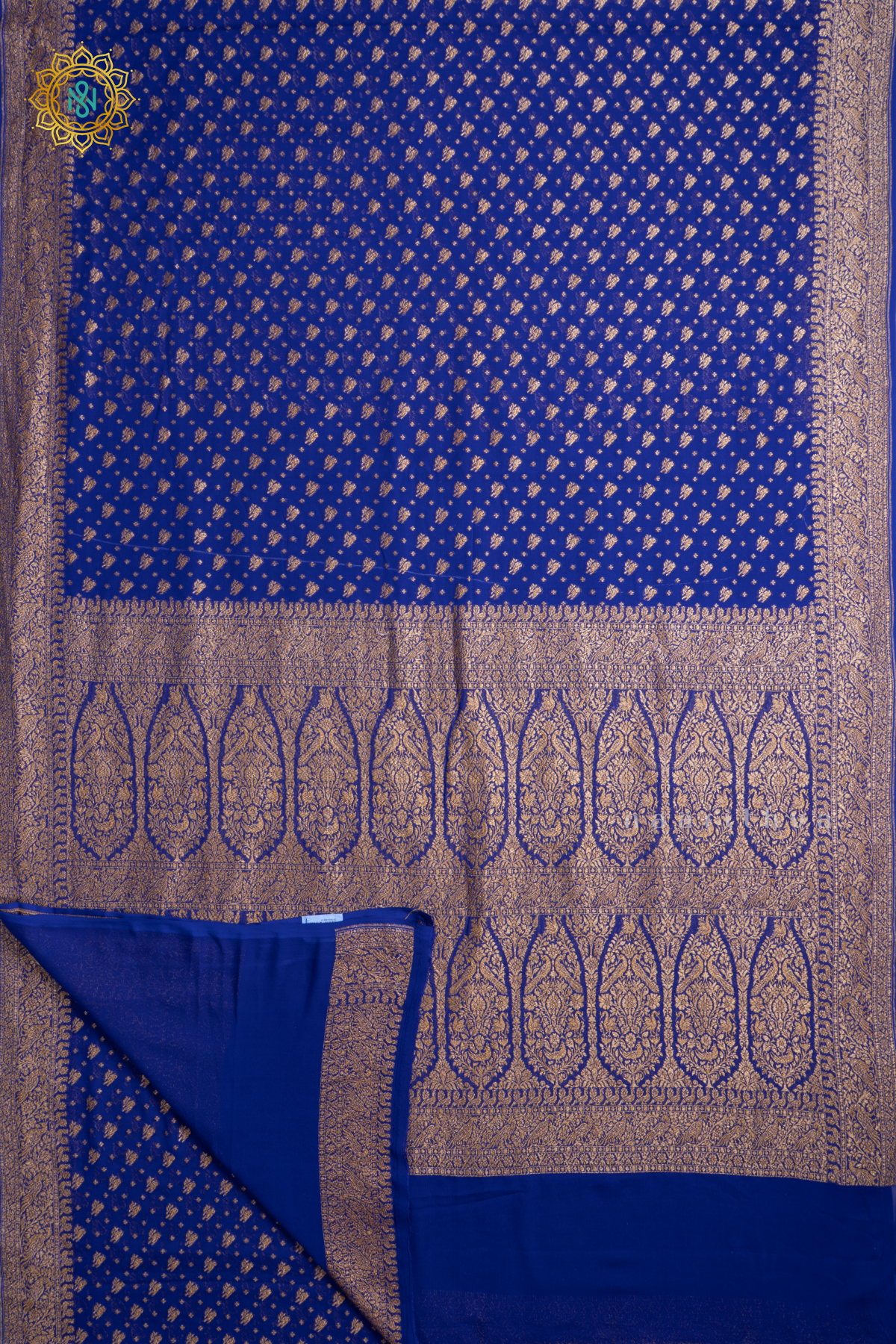Royal Blue Pure Banarasi Khaddi Georgette Allover Antique Zari Buttas On The Body With Contrast Zari Border & Pallu