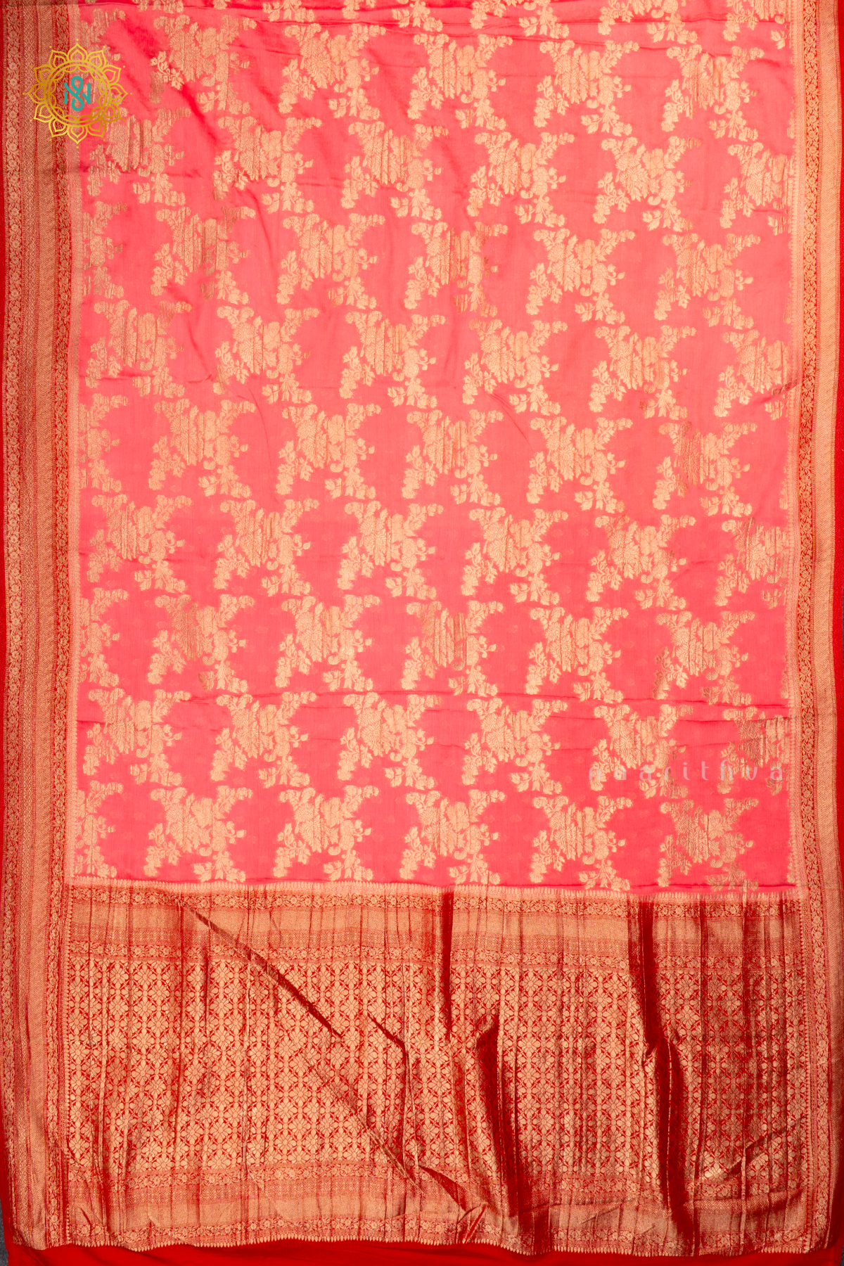 Light Pink With Red Semi Crepe Georgette With Zari Woven Floral Brocade Weaves And Zari Woven Contrast Border