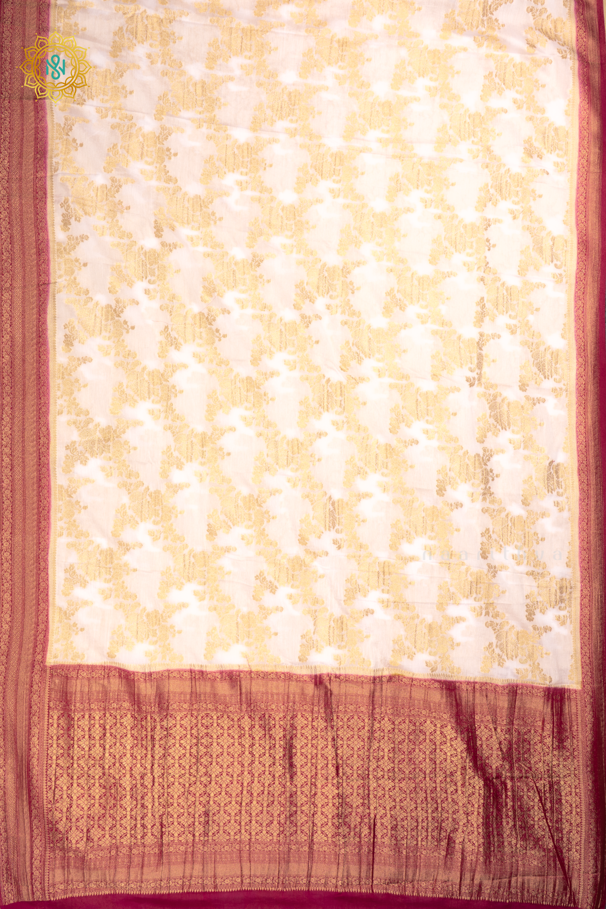 White With Pink Semi Crepe Georgette With Zari Woven Floral Brocade Weaves And Zari Woven Contrast Border