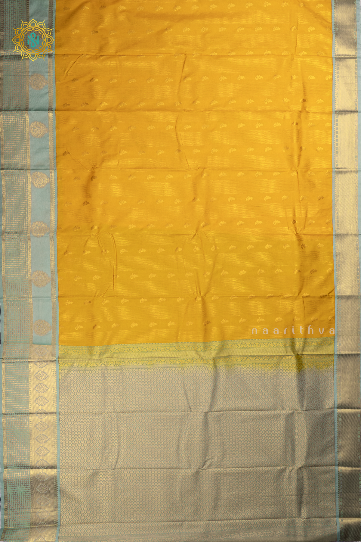 Yellow With Aqua Green Semi Kanchi Saree With Zari Buttas All Over And Contrast Zari Border